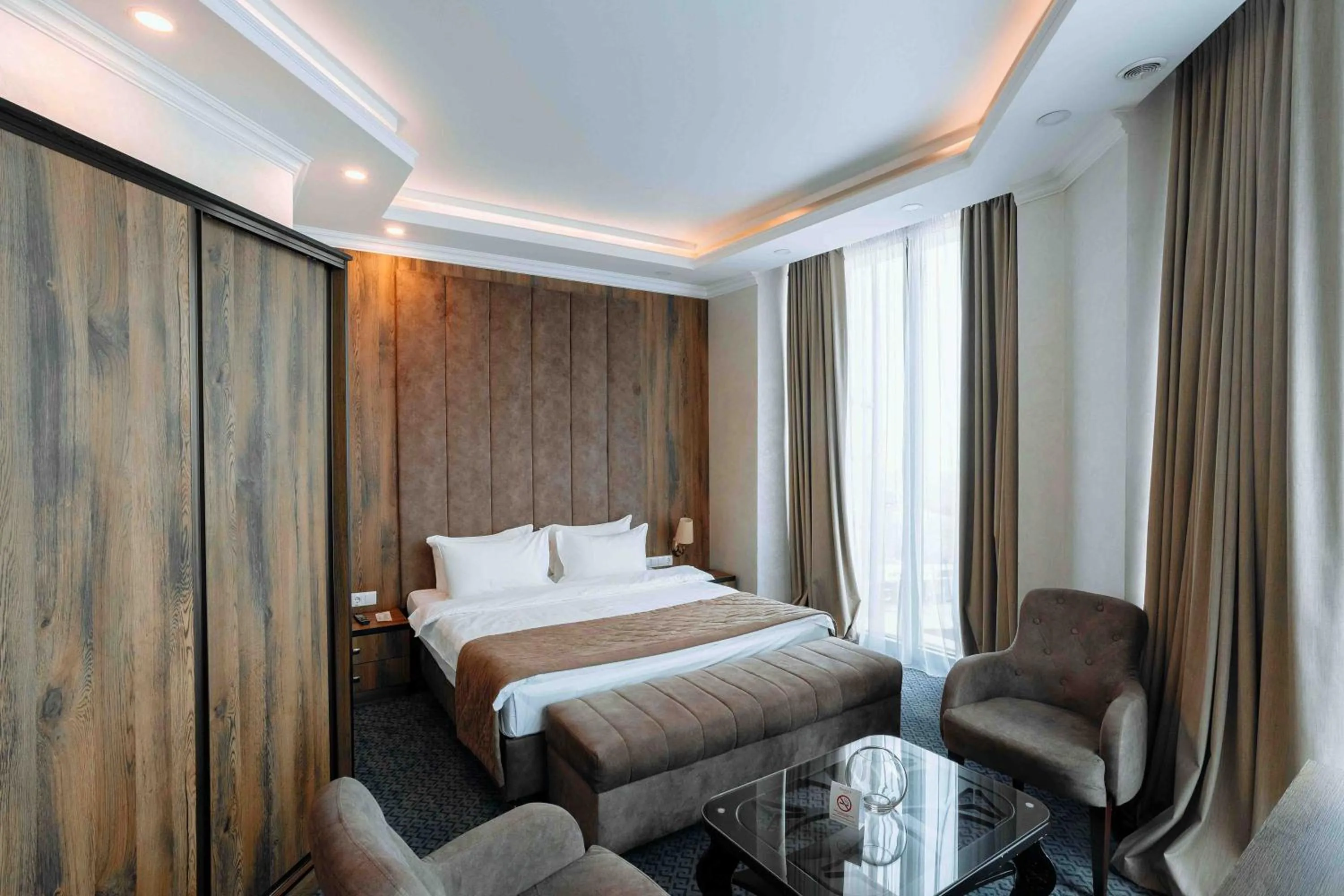 Bed in Ramada by Wyndham Shymkent