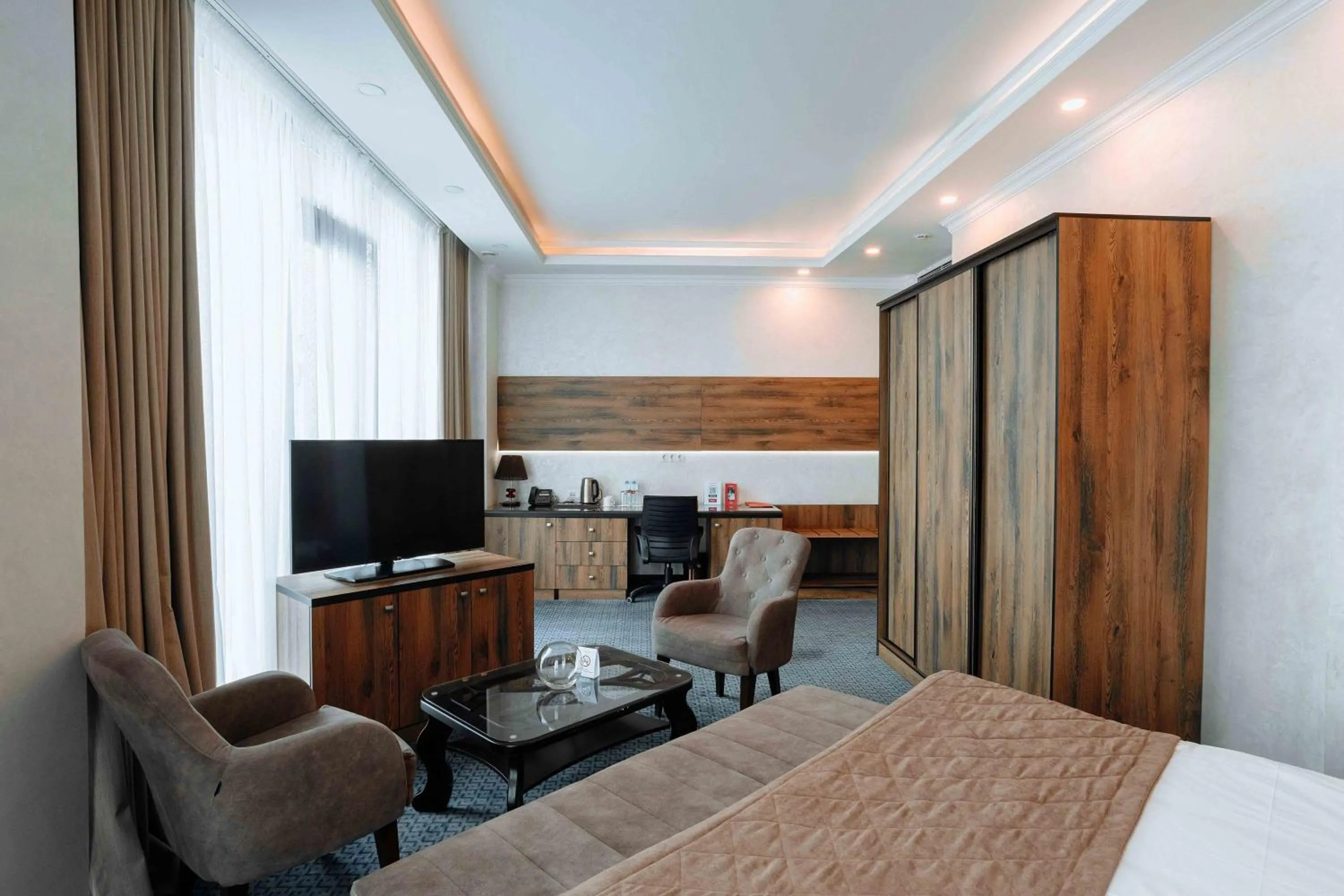 Bed in Ramada by Wyndham Shymkent