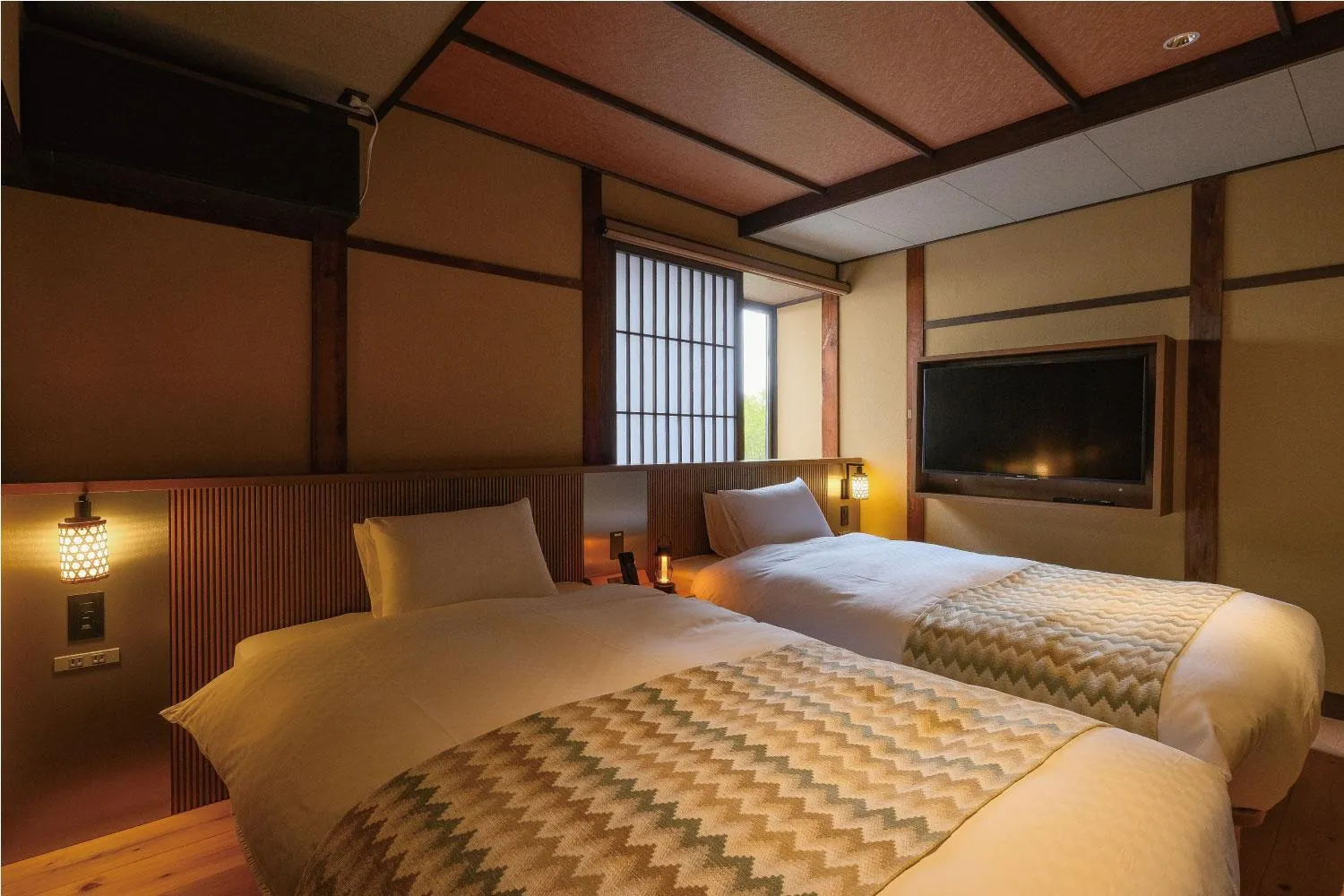 Bed in Tomonoura Shiomachi Hotel