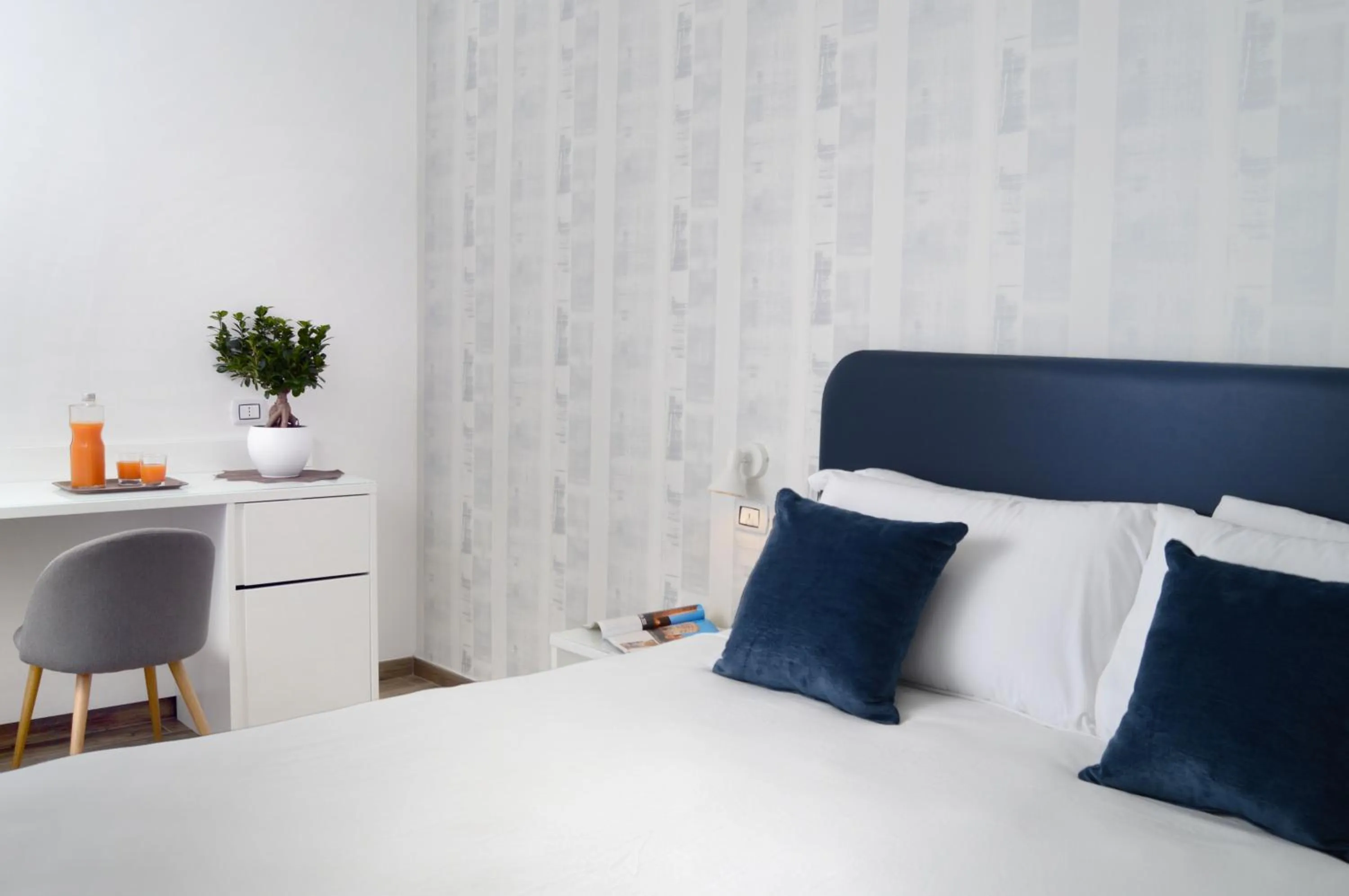 Bed in Napoliseason Rooms & Breakfast