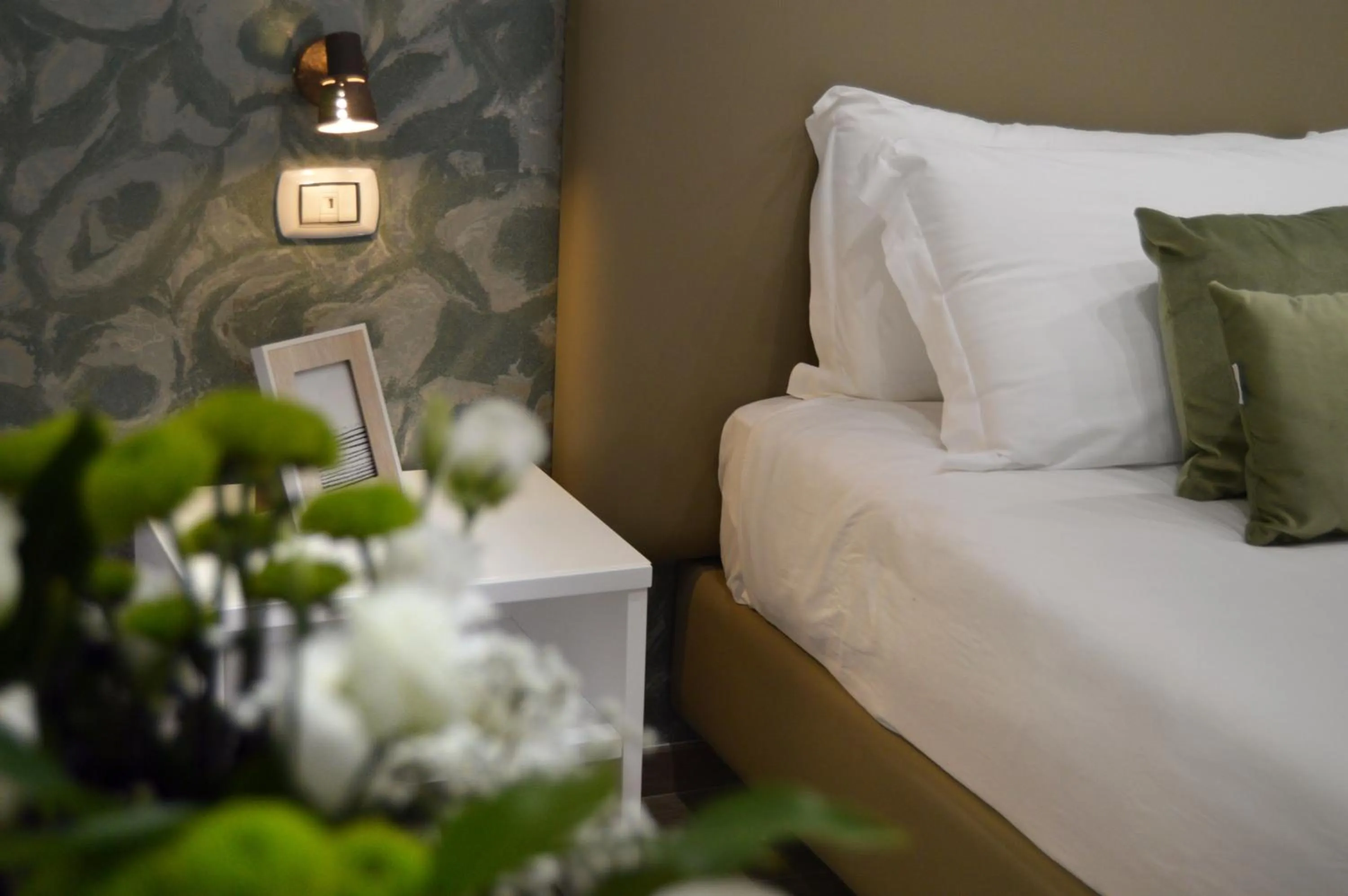 Decorative detail, Bed in Napoliseason Rooms & Breakfast