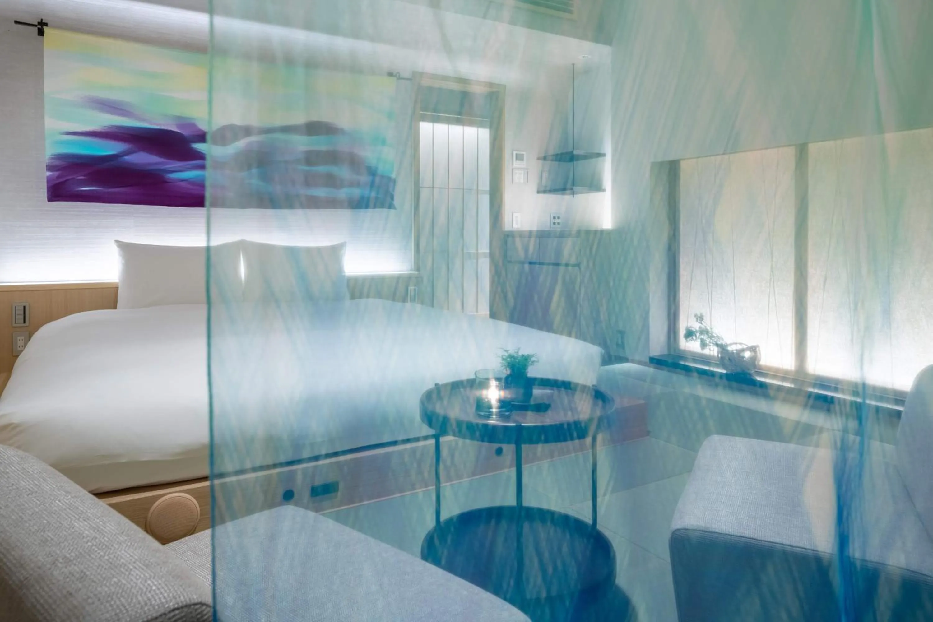 Living room, Bed in THE JUNEI HOTEL Kyoto