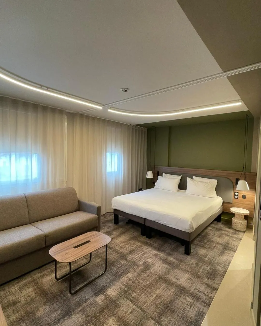 Bed in Novotel Suites Clermont Ferrand Polydome