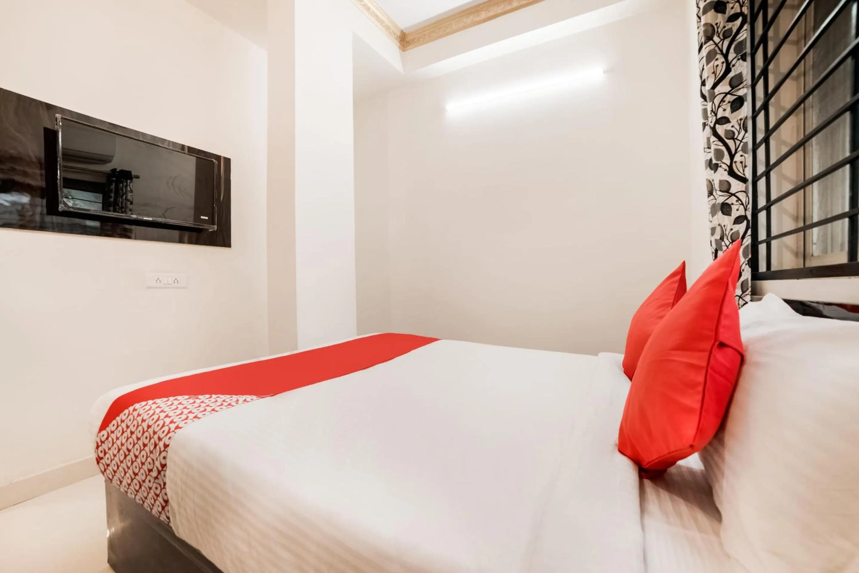 Bedroom, Bed in Super Hotel O Lucky Hotels Gachibowli