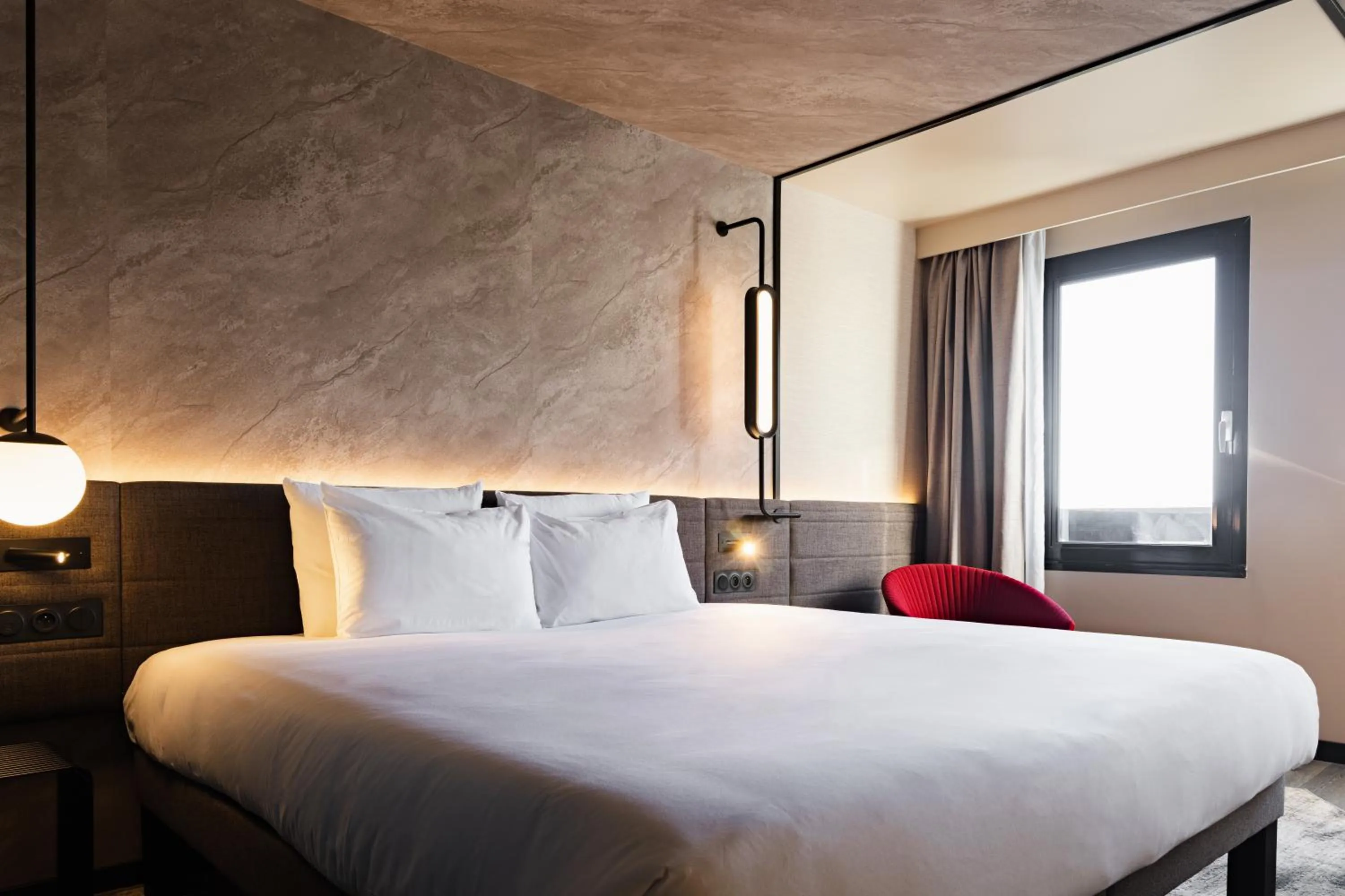 Bed in Novotel Paris Suresnes Longchamp