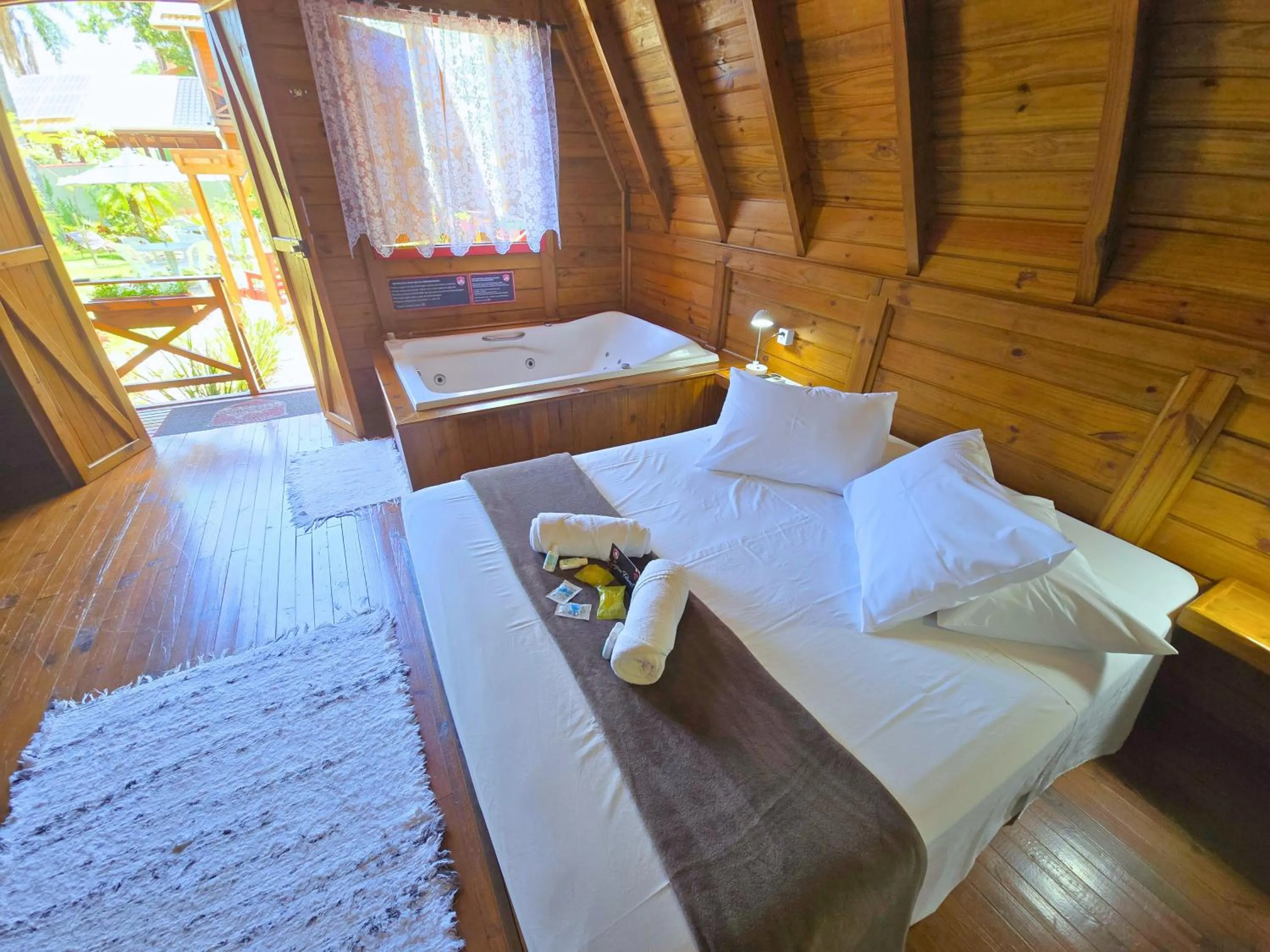 Bed in Chalé Suiço Bombinhas