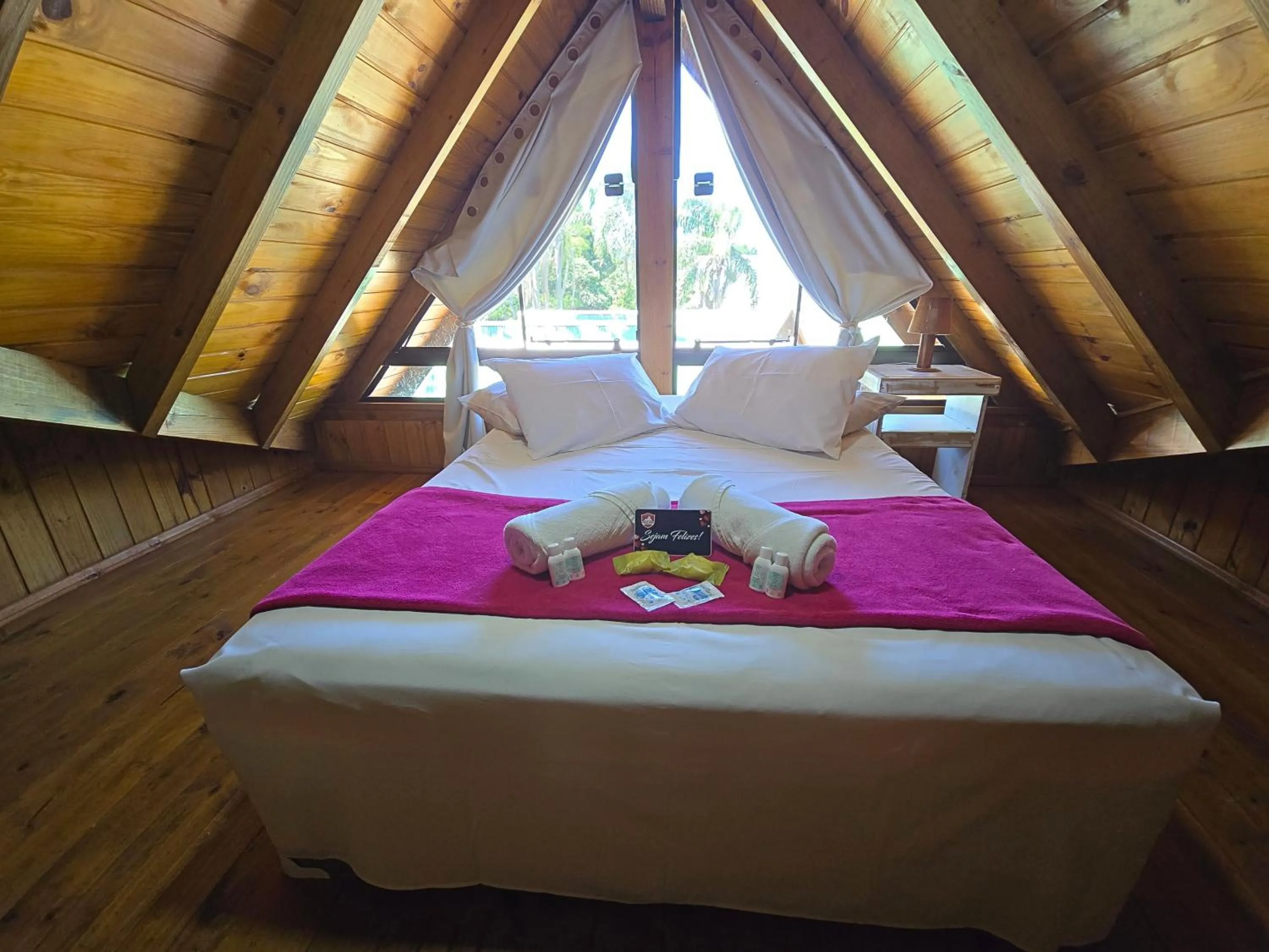 Bed in Chalé Suiço Bombinhas