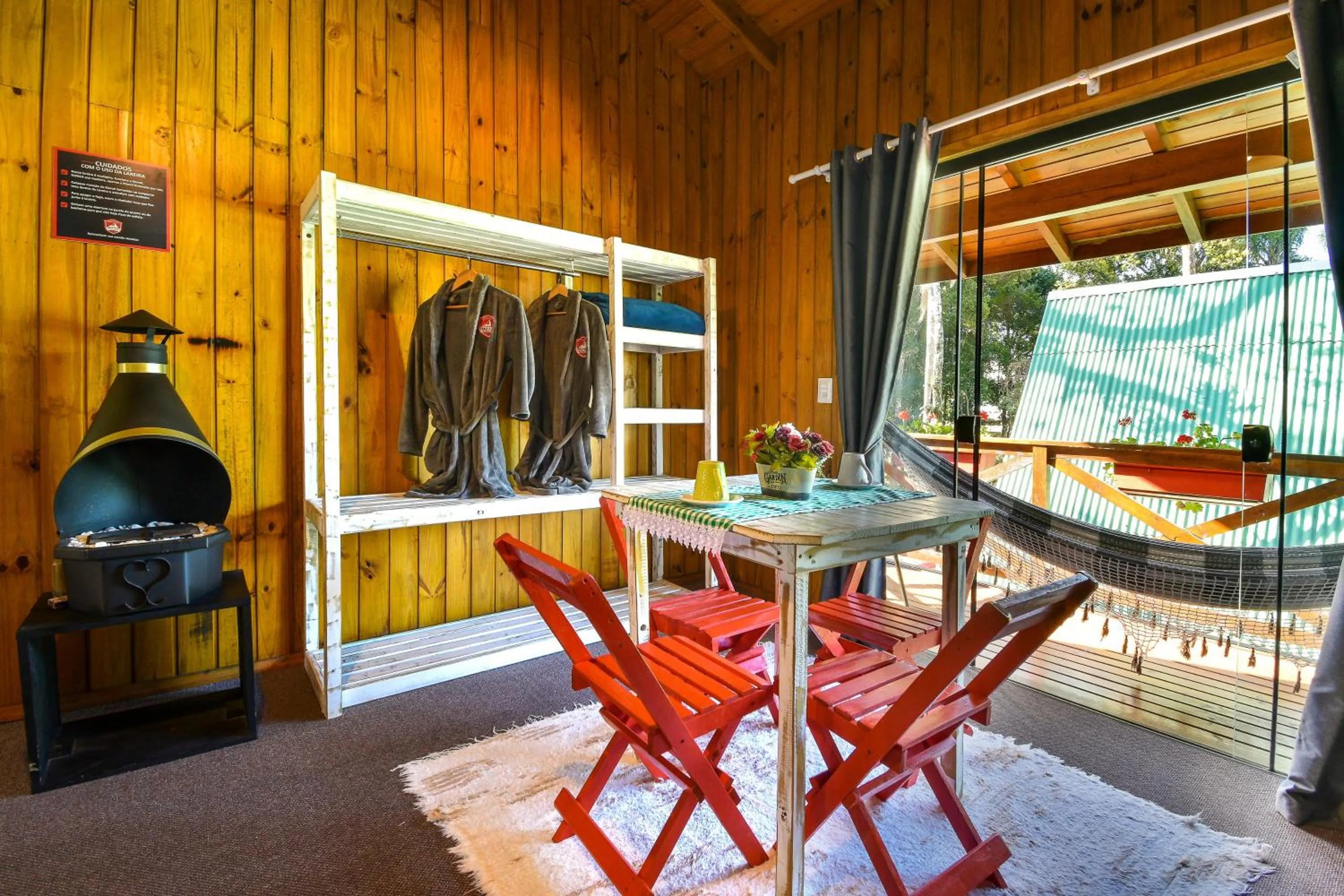 Seating area in Pousada Chalé Suiço Bombinhas