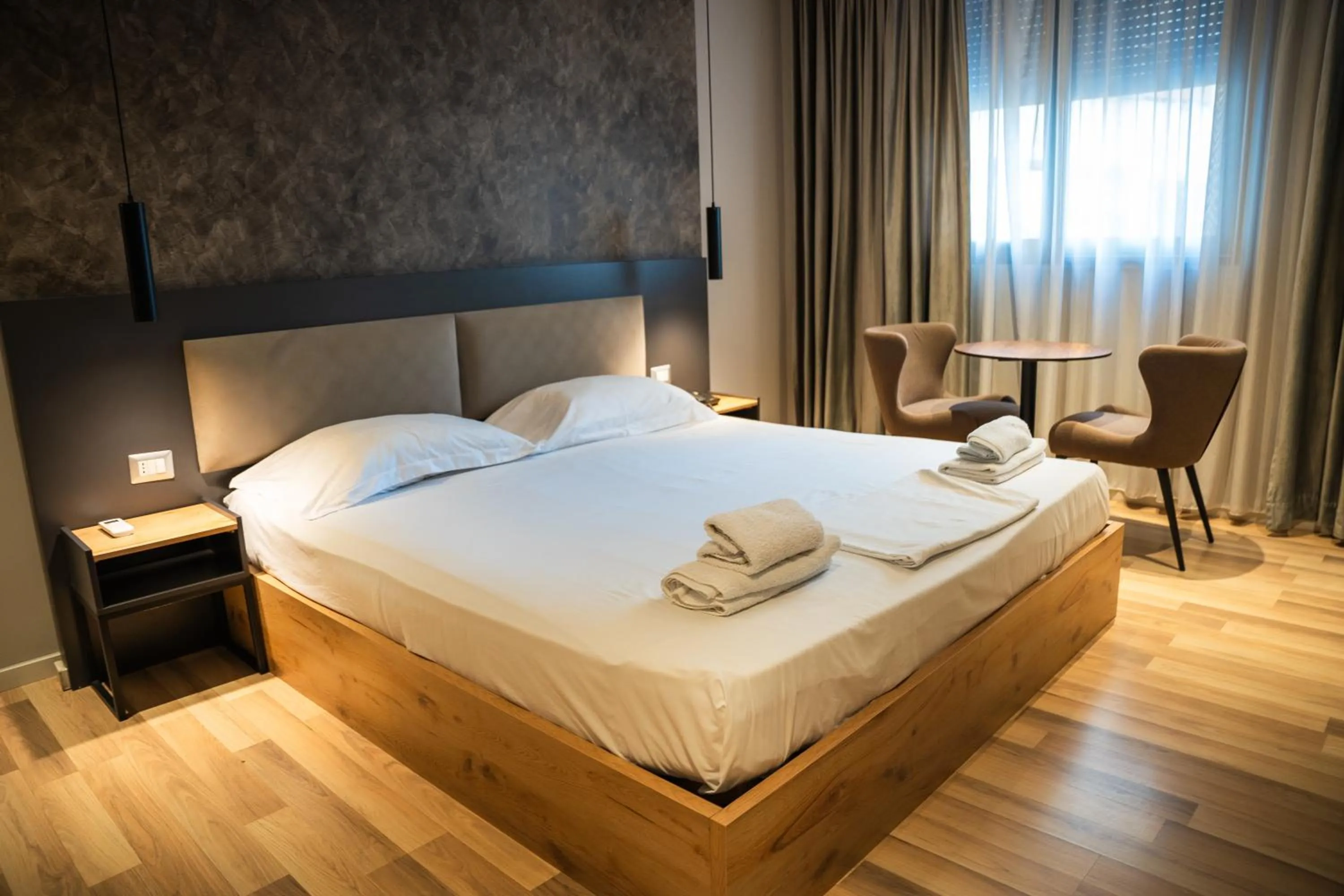 Bed in Center Boutique Hotel