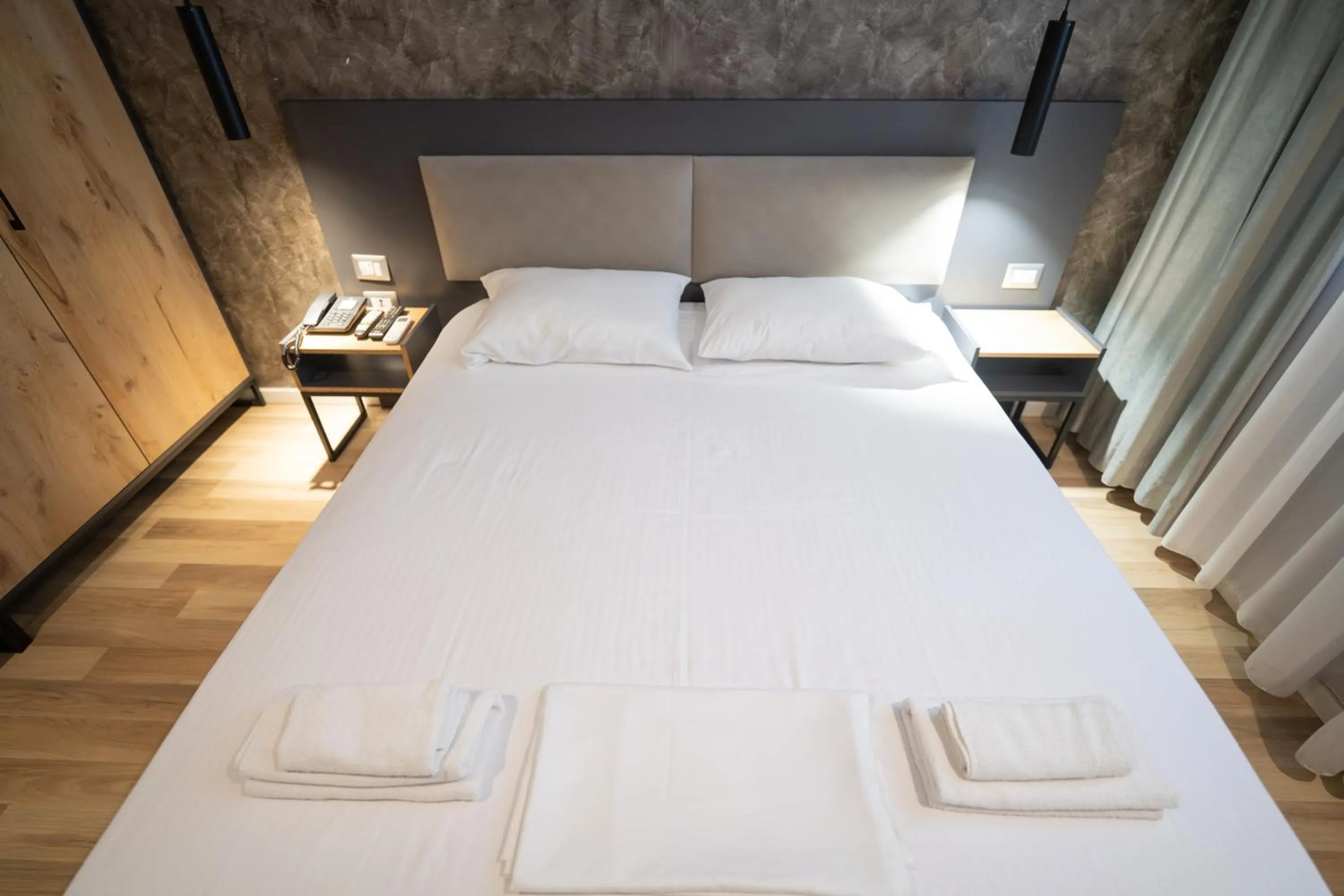 Bed in Center Boutique Hotel