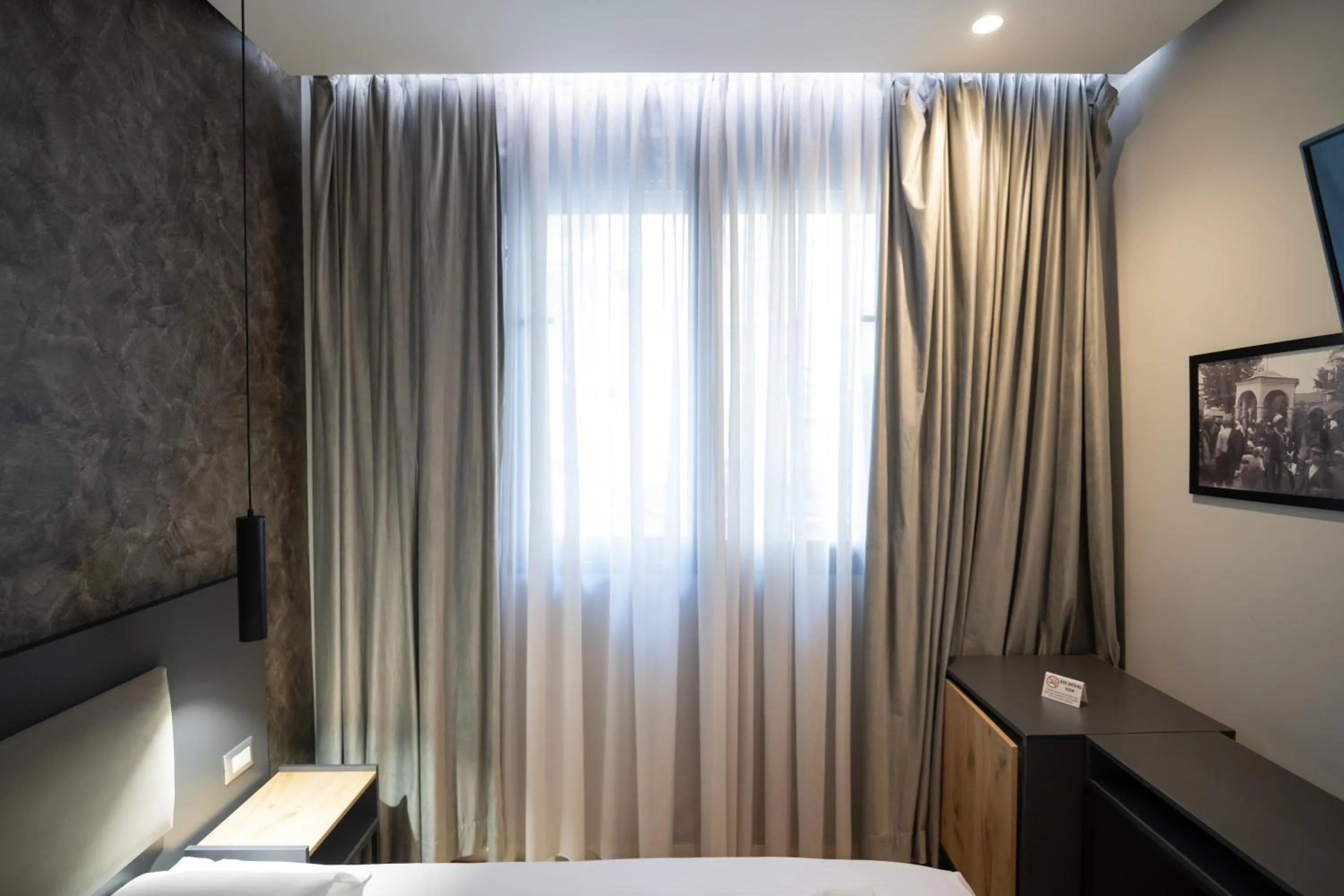 Bed in Center Boutique Hotel