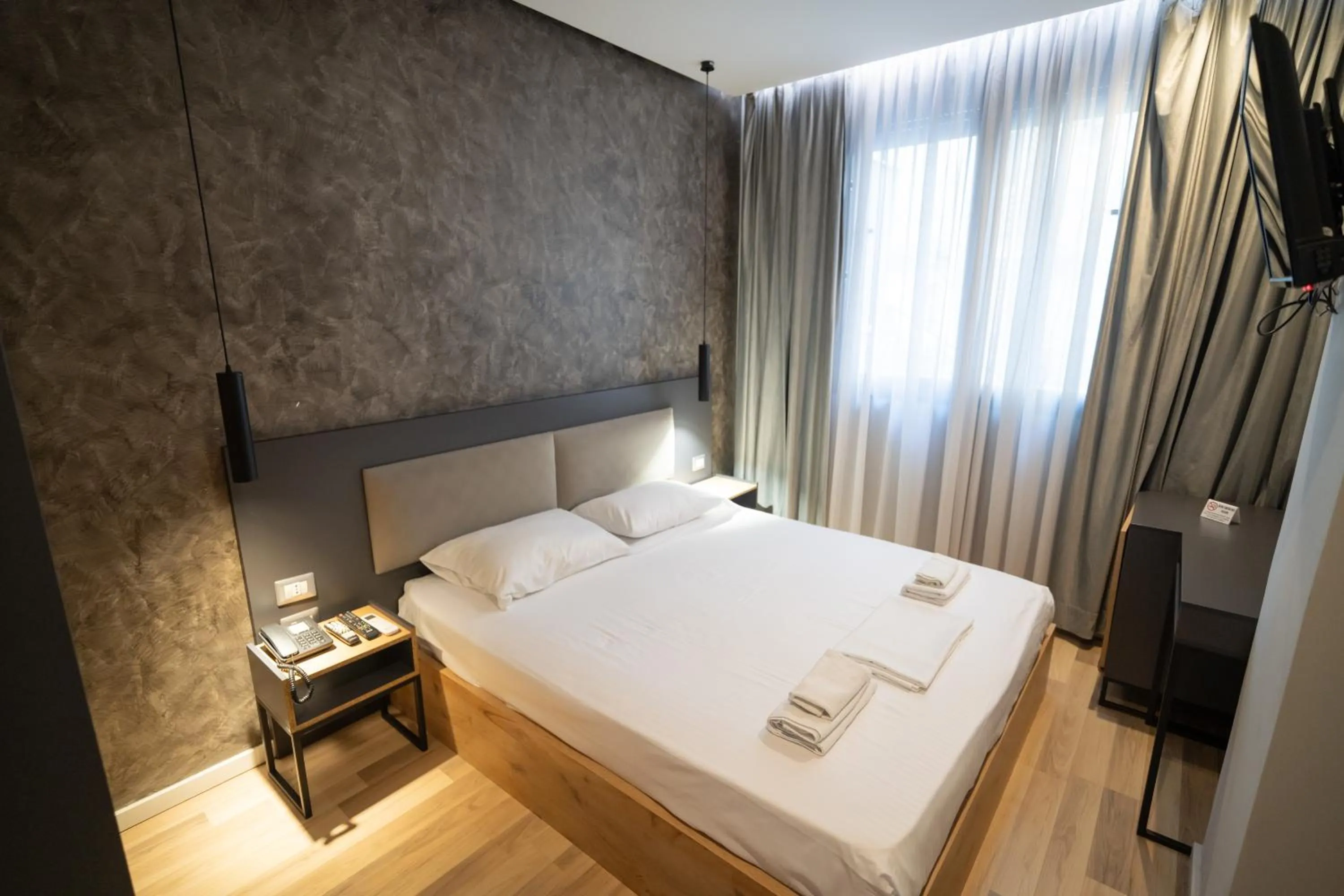 Bed in Center Boutique Hotel