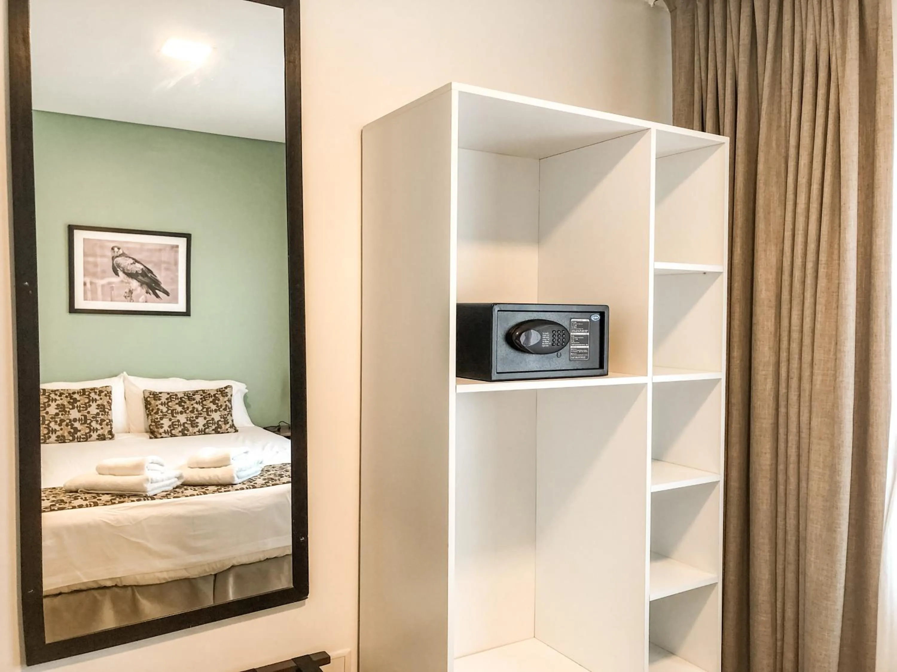 Bed in Senderos Aparts & Suites