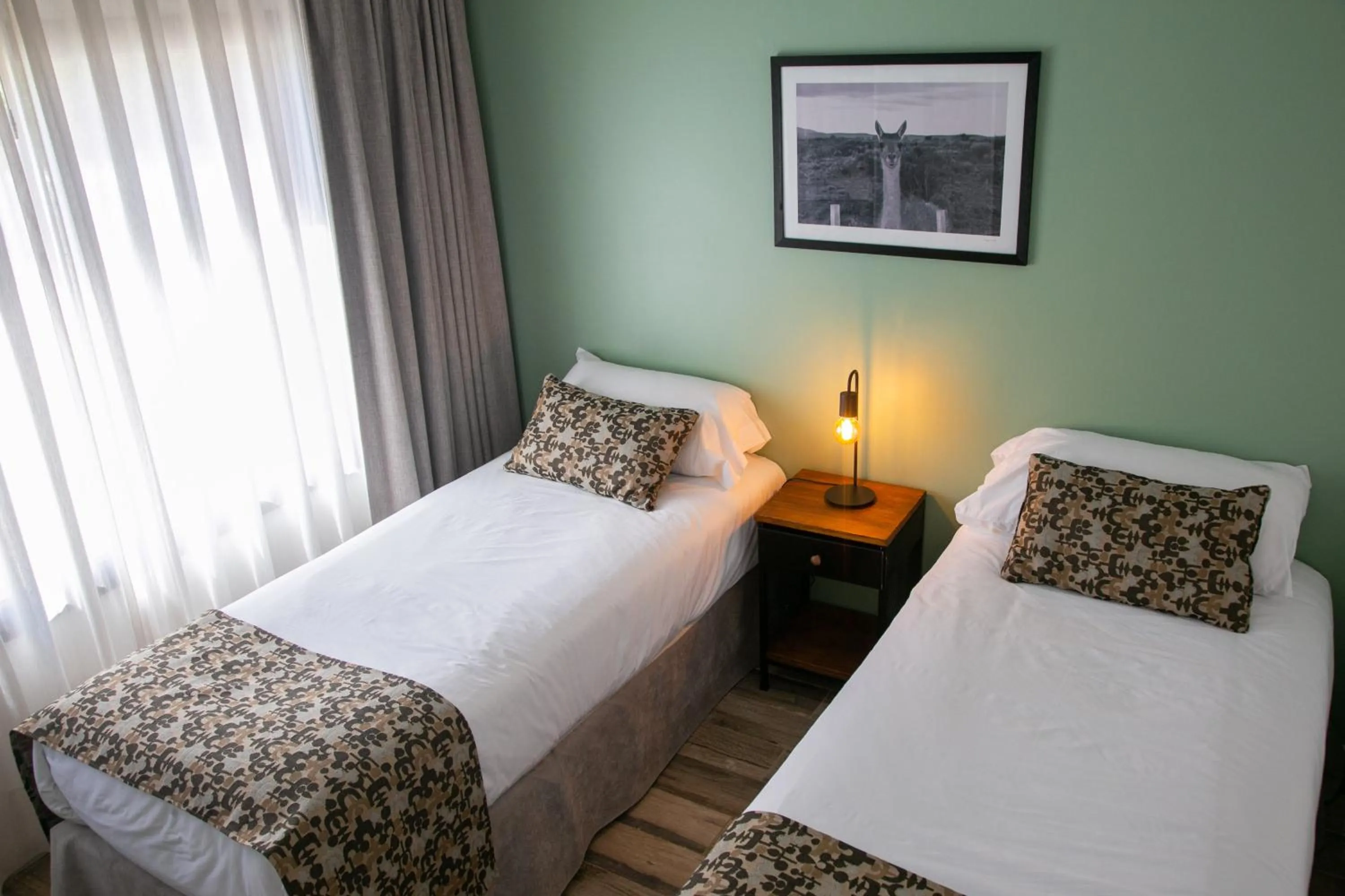 Bed in Senderos Aparts & Suites