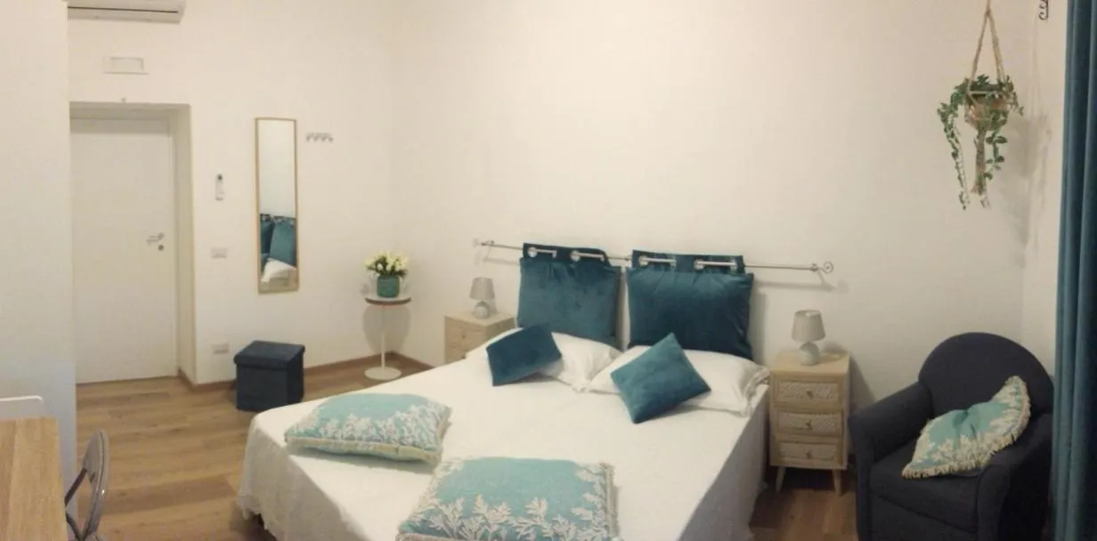 Bed in Ostia Lido Central Rooms