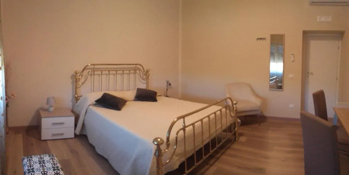 Bed in Ostia Lido Central Rooms