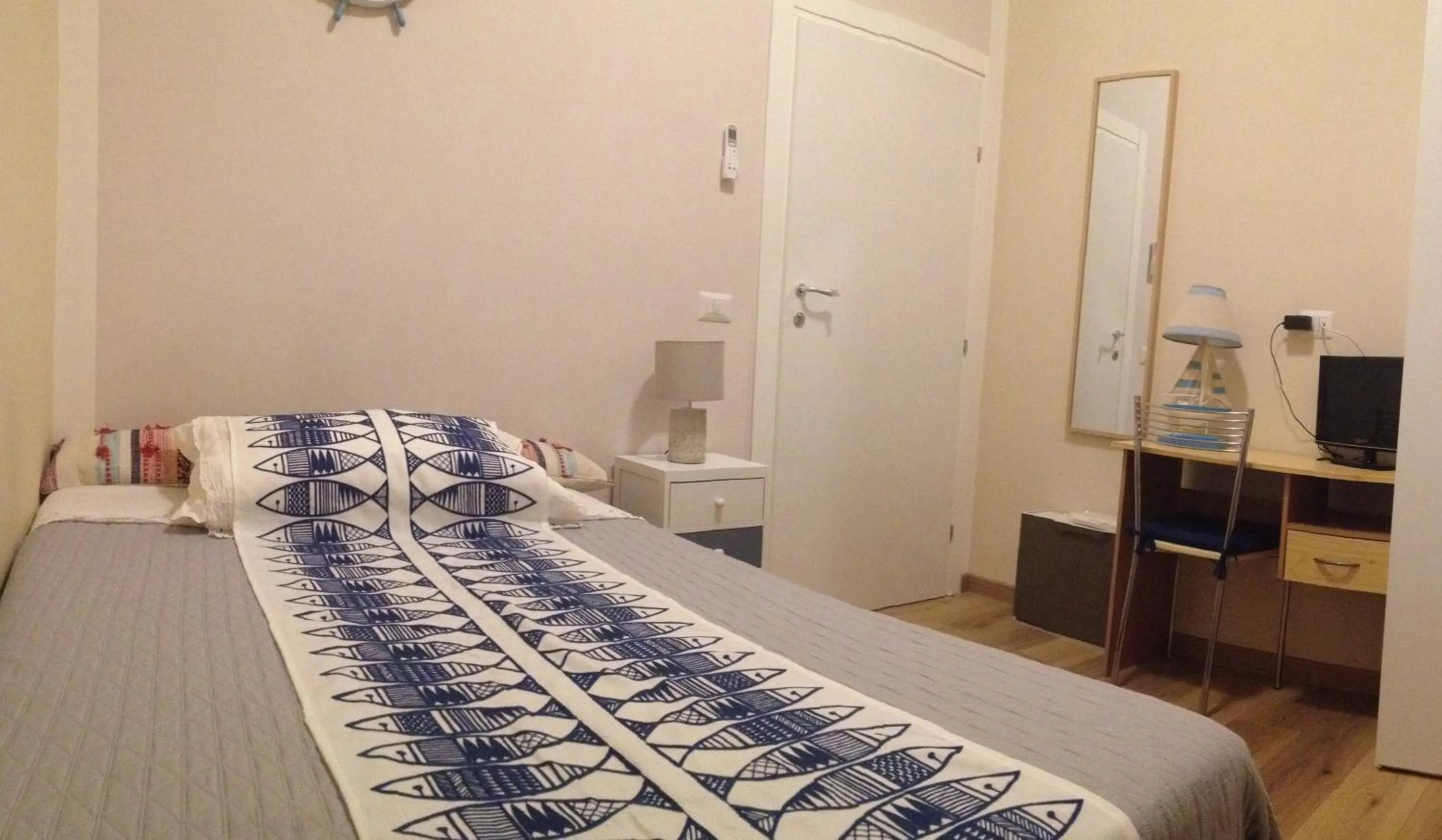 Bed in Ostia Lido Central Rooms