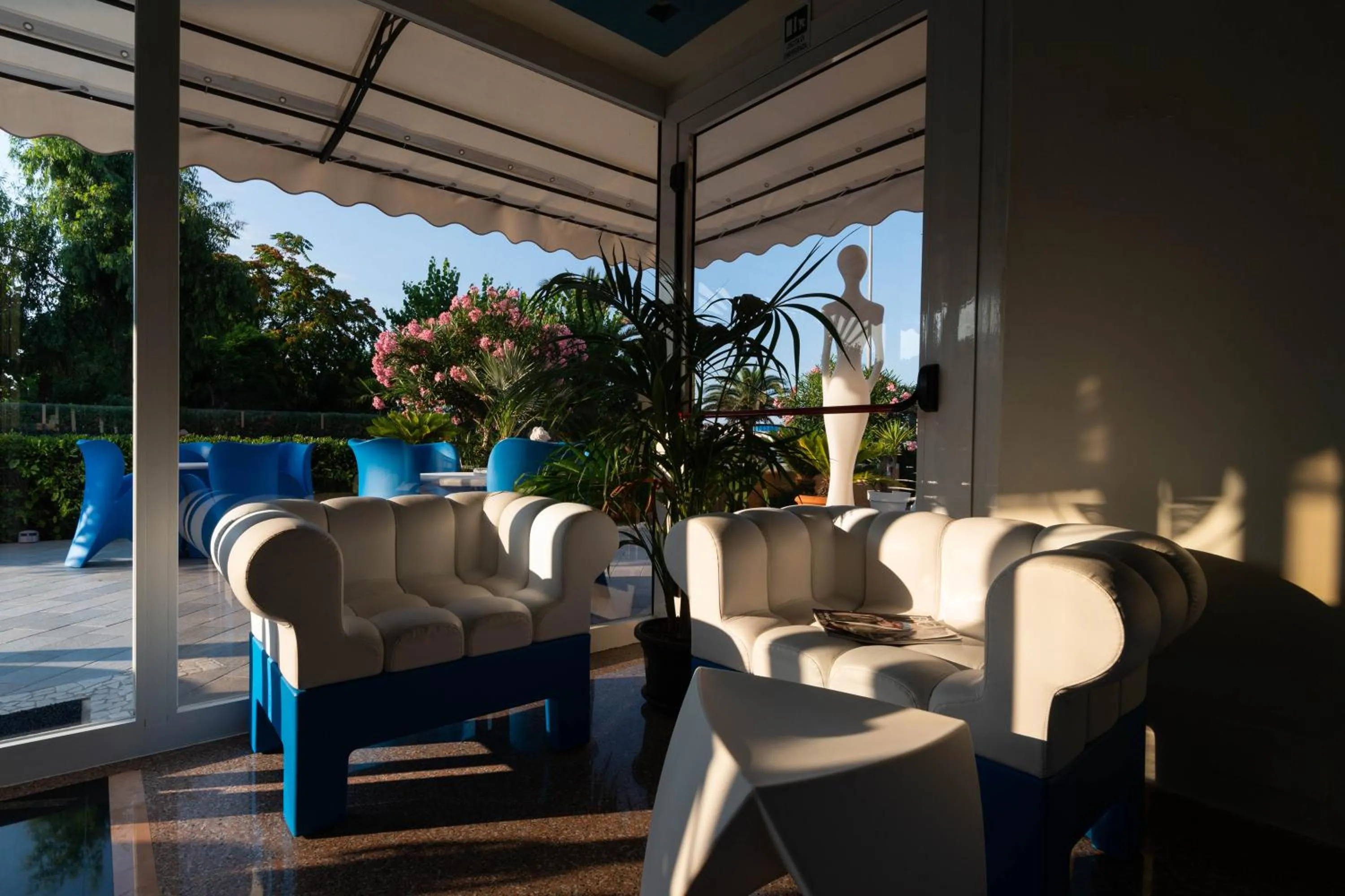 Communal lounge/ TV room in Hotel Paradiso