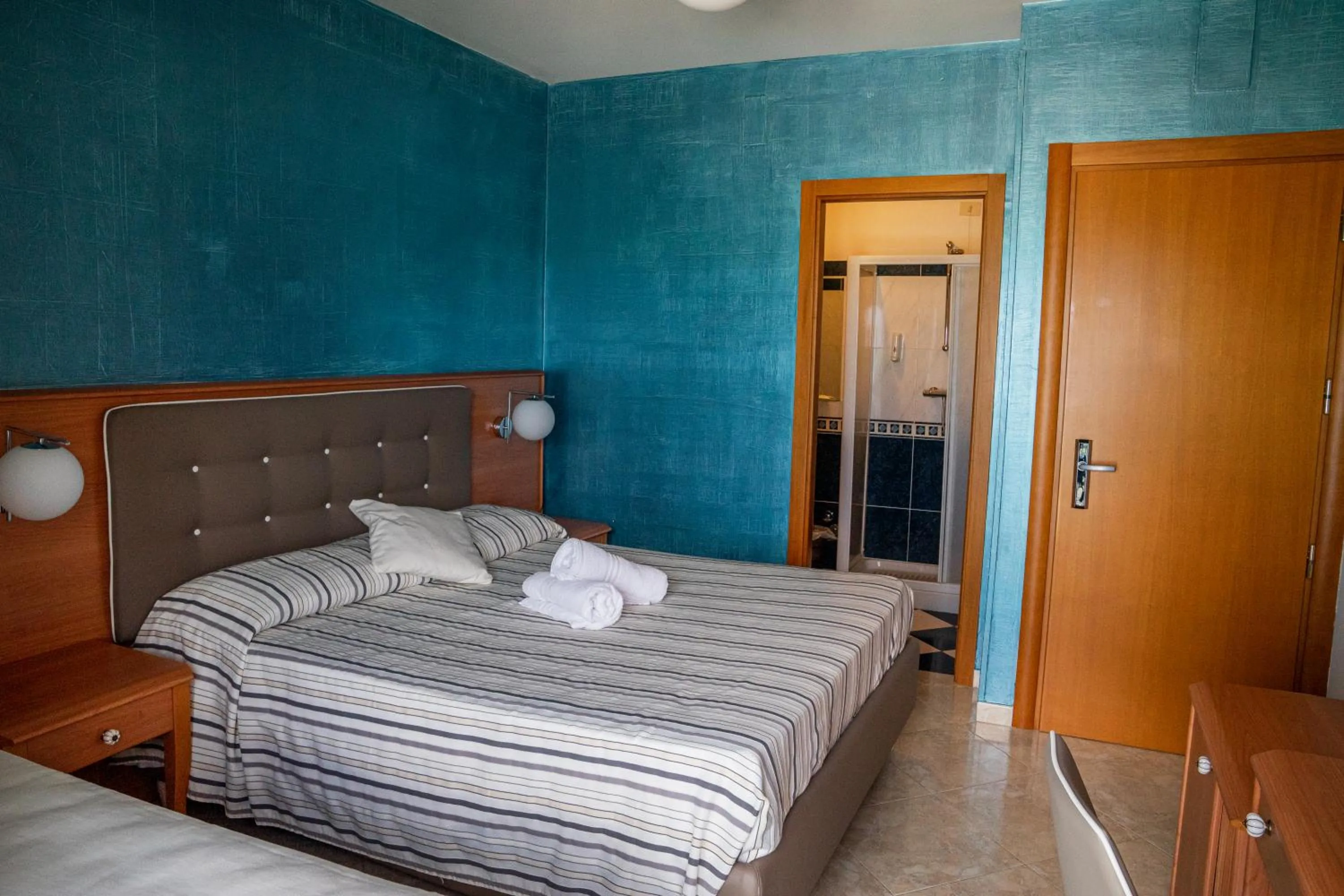 Bed in Hotel Paradiso