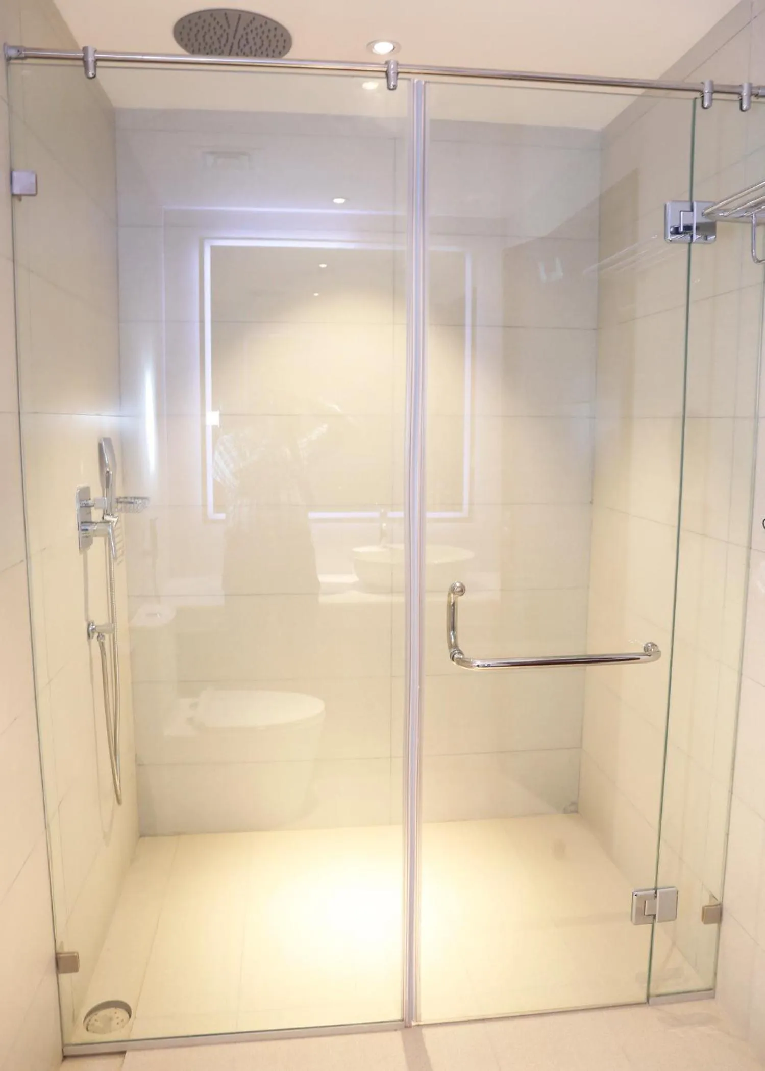 Bathroom in Indigo Heights Hotel & Suites