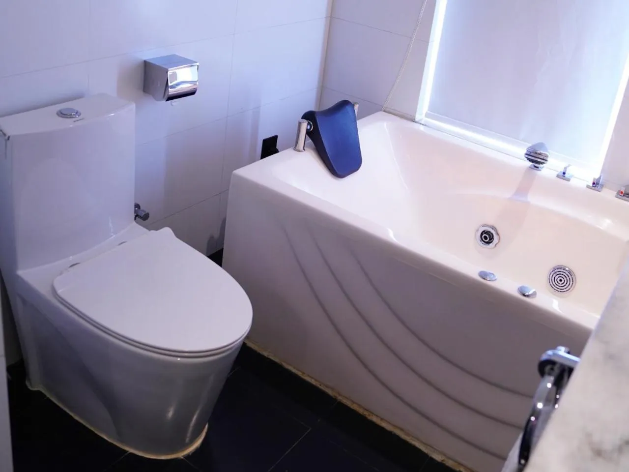 Bathroom in Indigo Heights Hotel & Suites