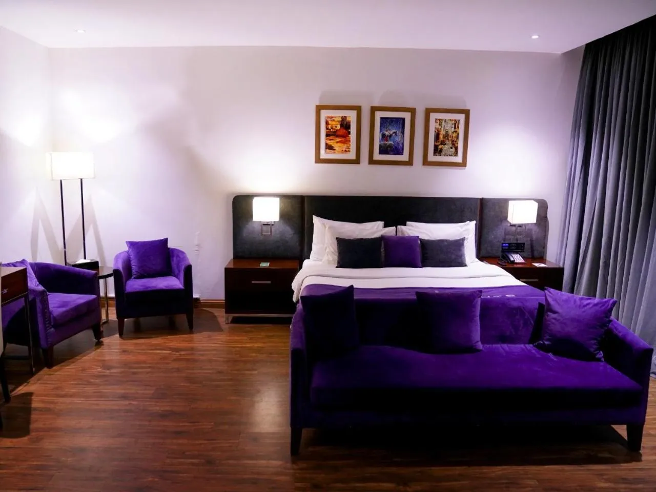 Bed in Indigo Heights Hotel & Suites