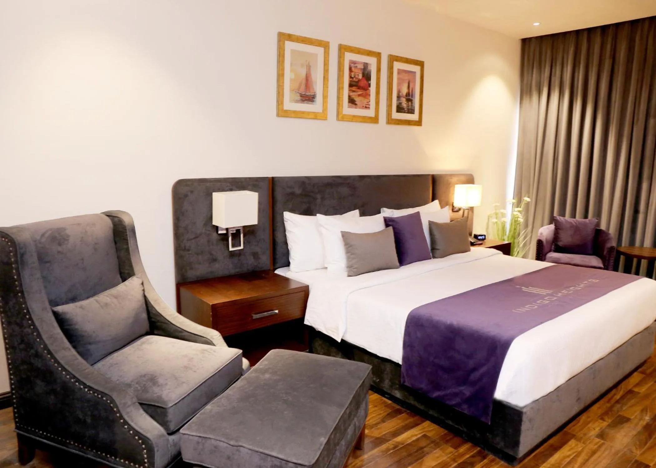 Bed in Indigo Heights Hotel & Suites