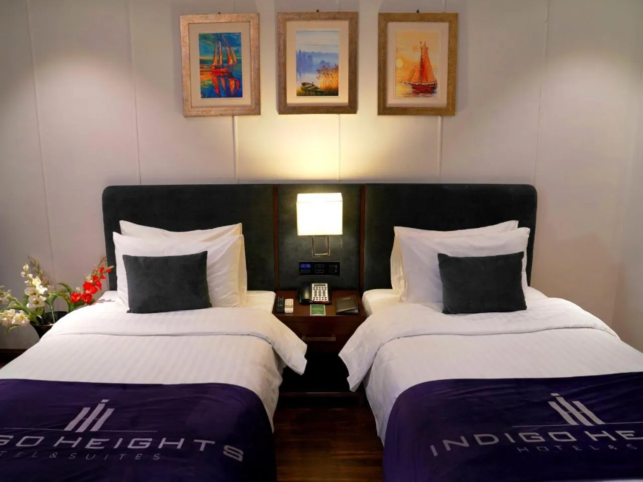 Bed in Indigo Heights Hotel & Suites