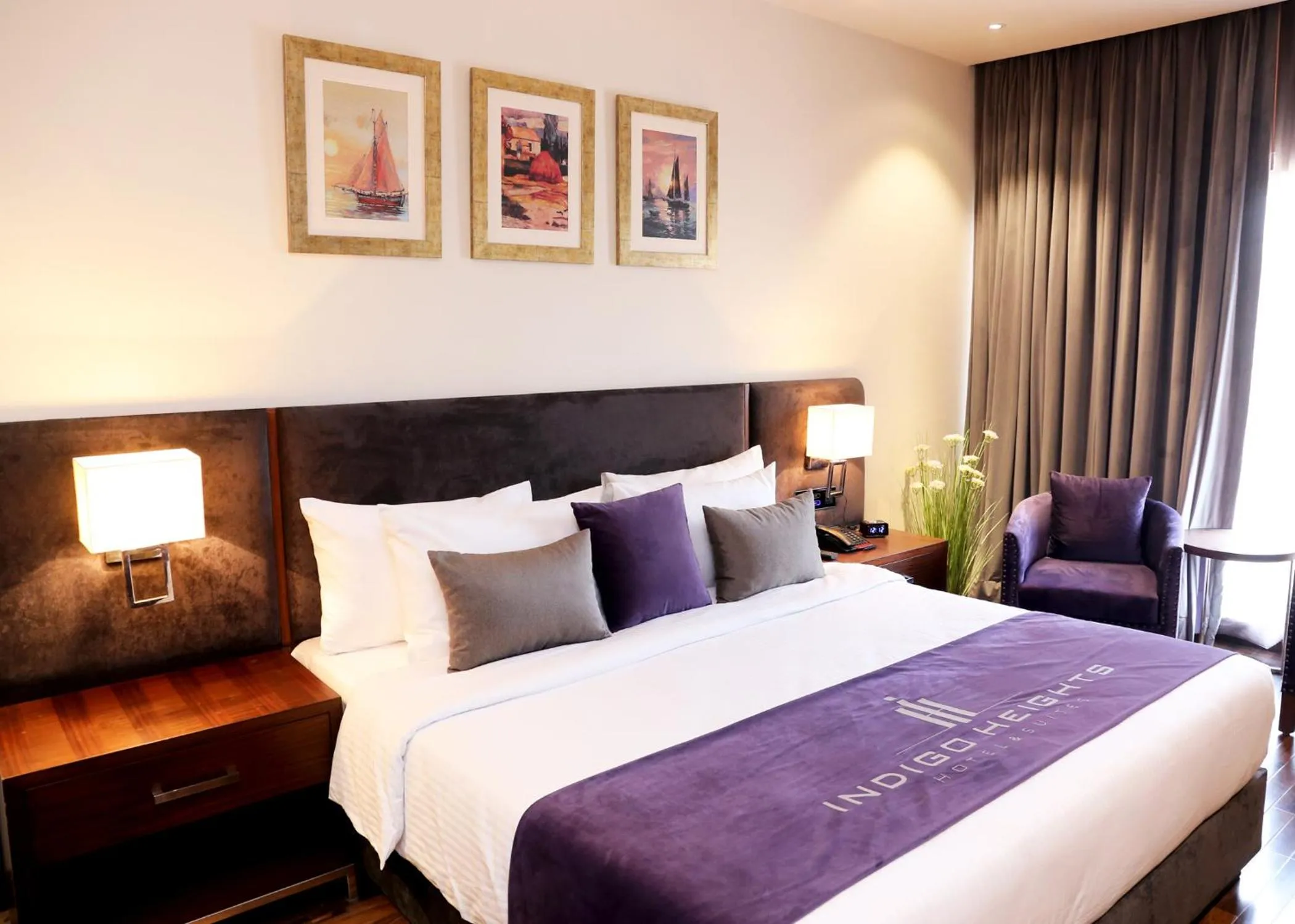 Bed in Indigo Heights Hotel & Suites