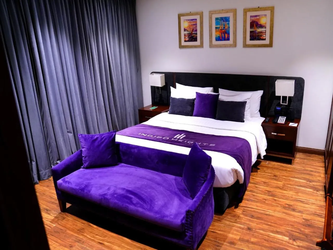 Bed in Indigo Heights Hotel & Suites