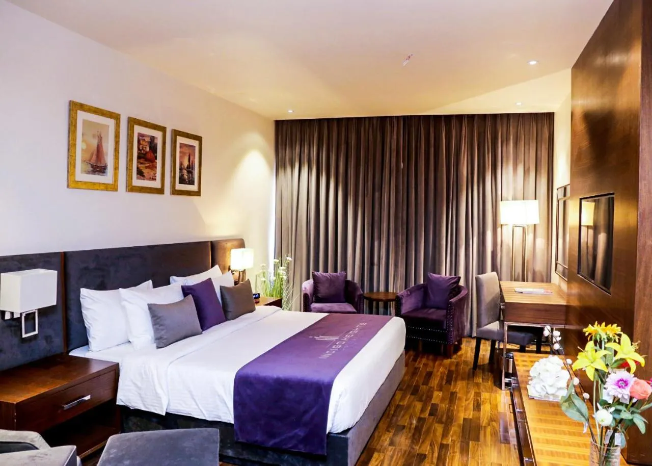 Photo of the whole room, Bed in Indigo Heights Hotel & Suites