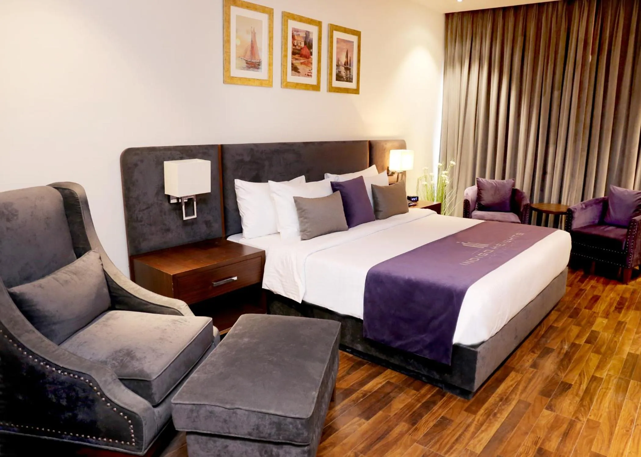 Bed in Indigo Heights Hotel & Suites