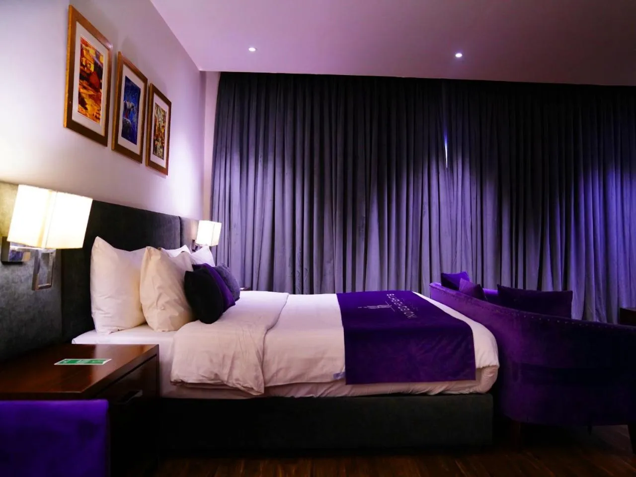 Bed in Indigo Heights Hotel & Suites