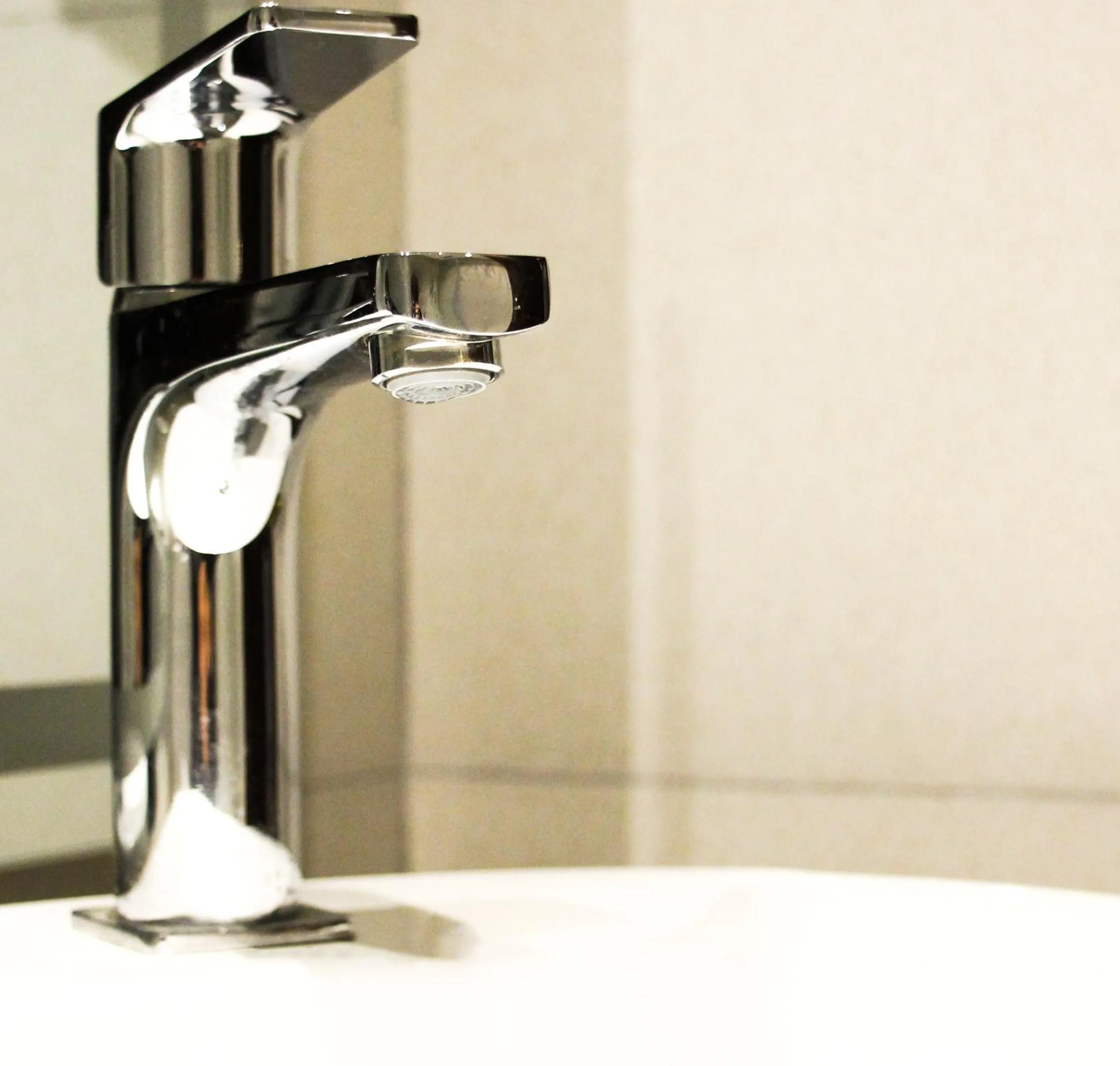 Bathroom in Indigo Heights Hotel & Suites