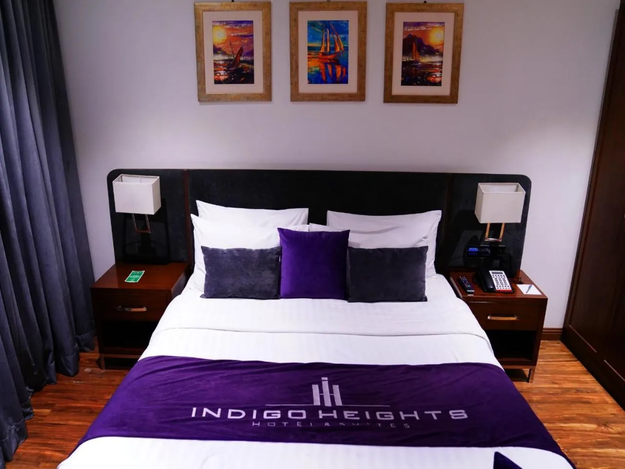 Bed in Indigo Heights Hotel & Suites