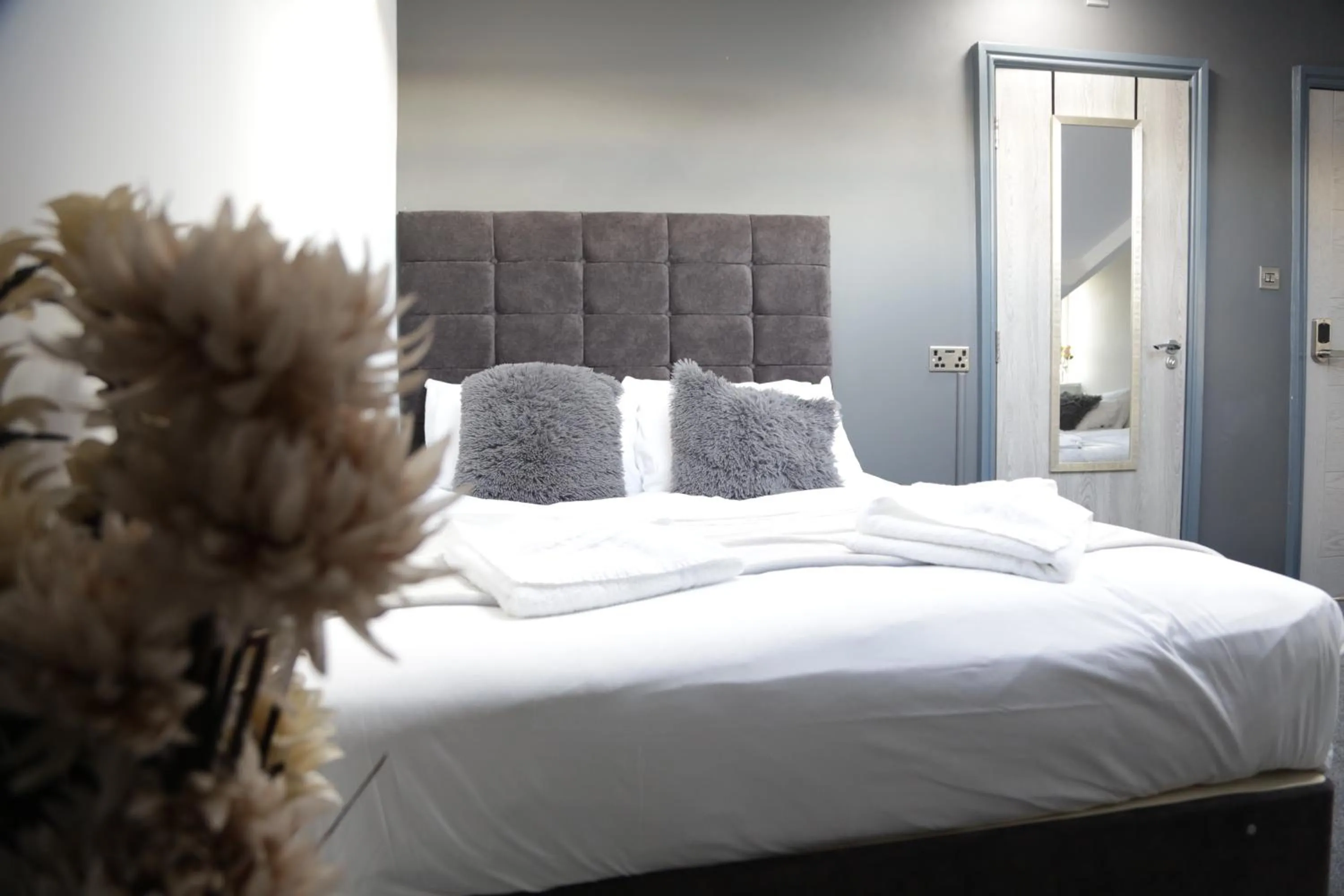 Bedroom in Park City Suites Hotel