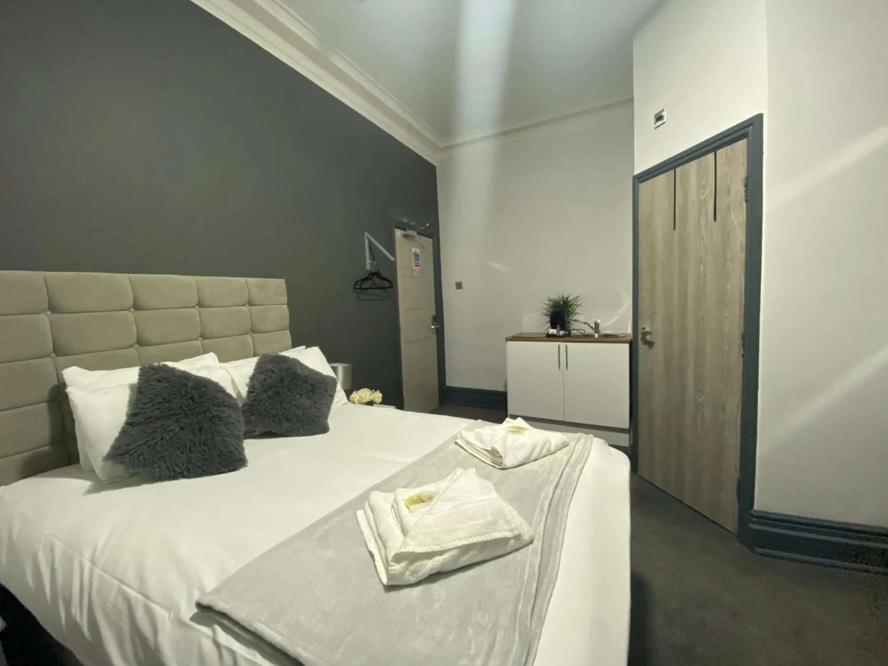 Bedroom in Park City Suites Hotel