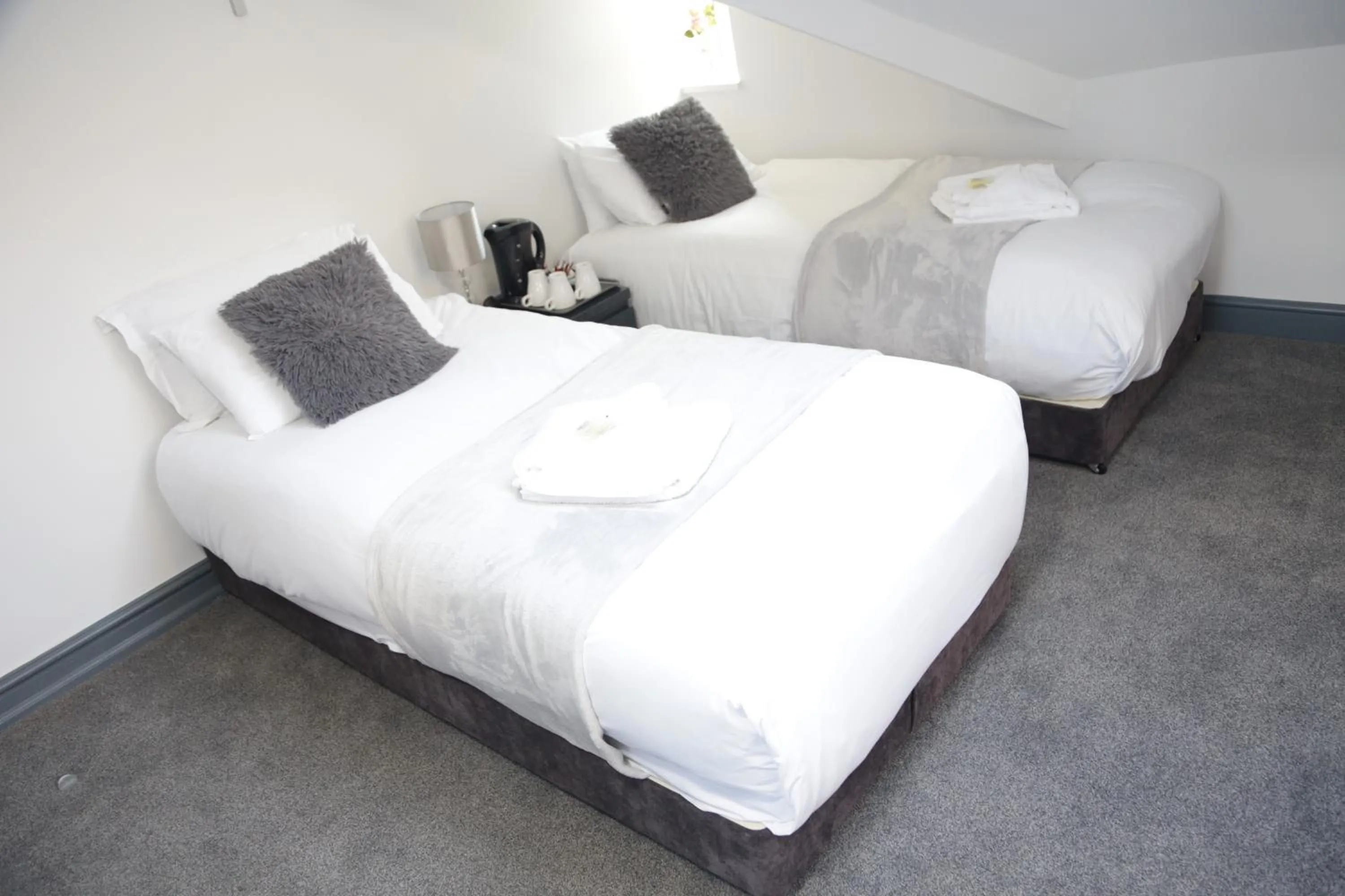 Bed in Park City Suites Hotel