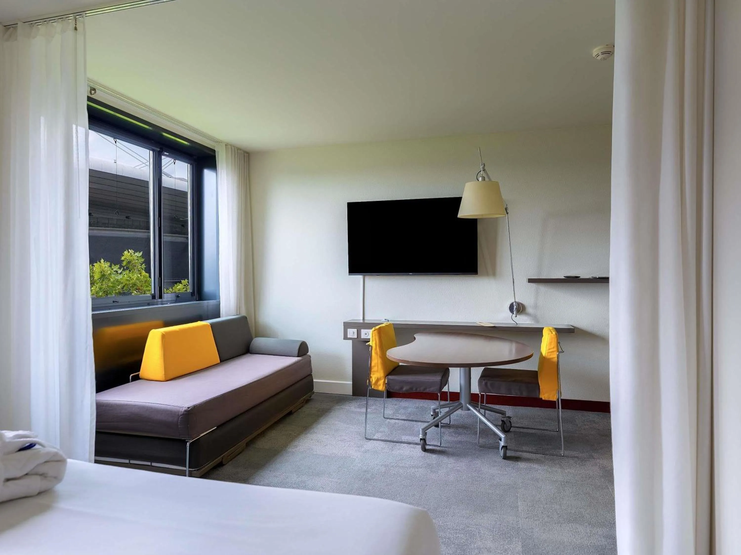 Bedroom, Bed in Novotel Suites Paris Stade de France