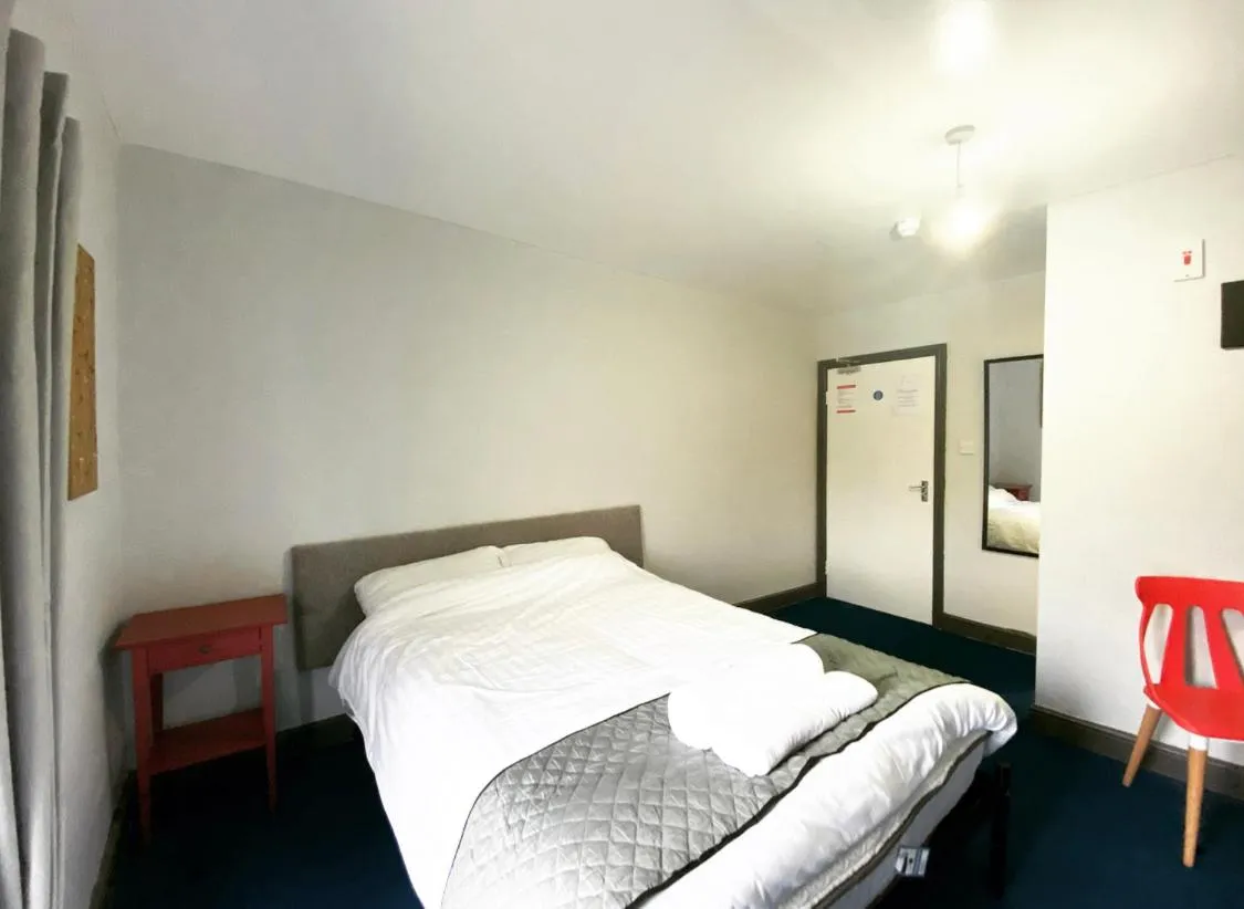 Photo of the whole room, Bed in King Street Hotel