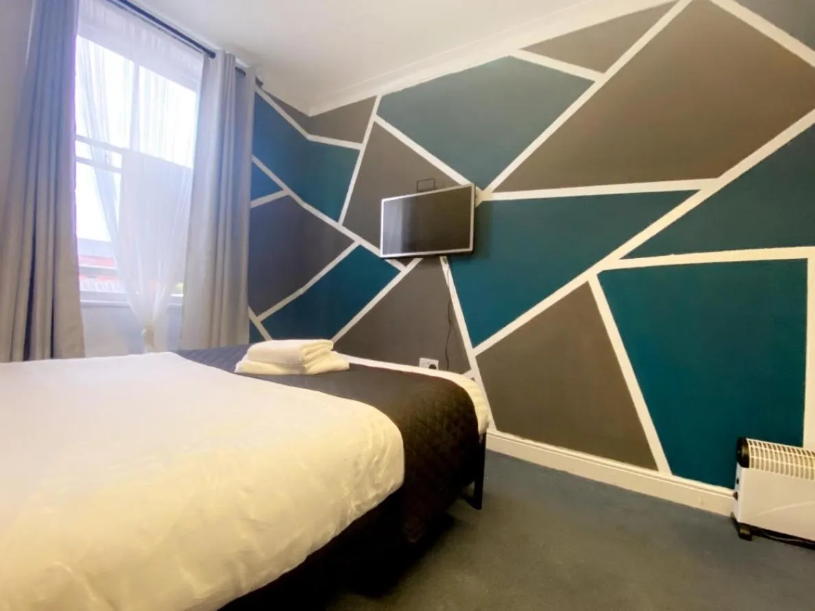 Photo of the whole room, Bed in King Street Hotel