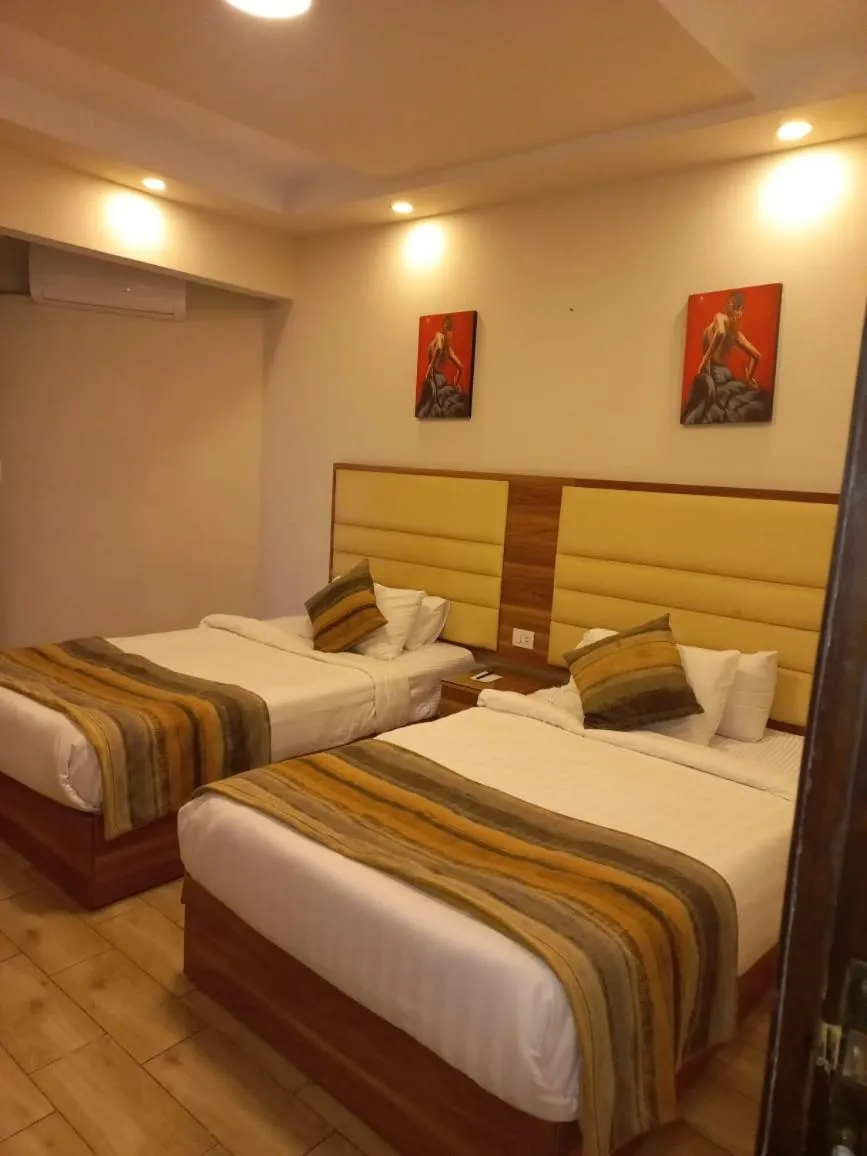 Bed in Jewel San Stefano Hotel