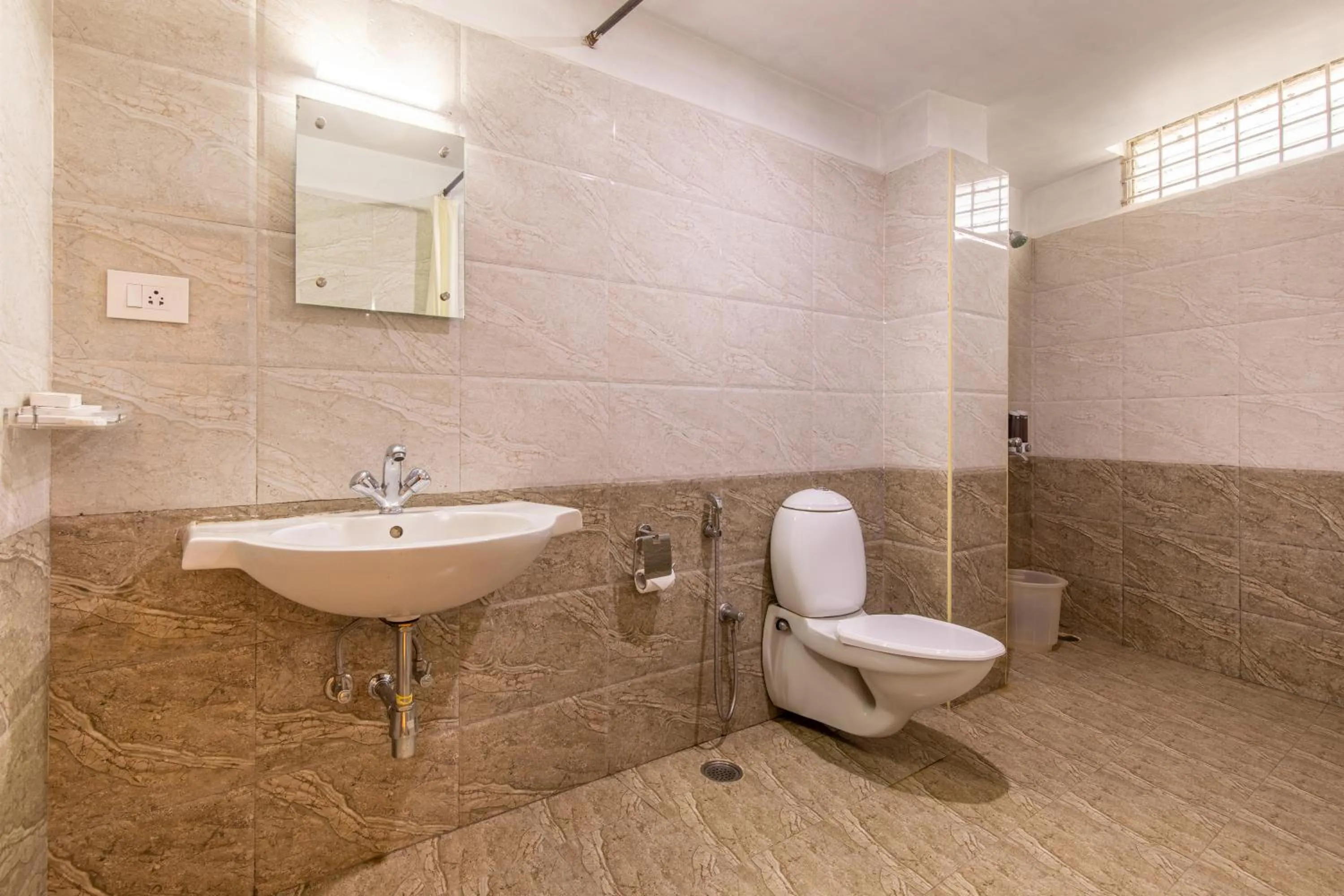 Bathroom in Vinayaga Inn by Poppys, Ooty