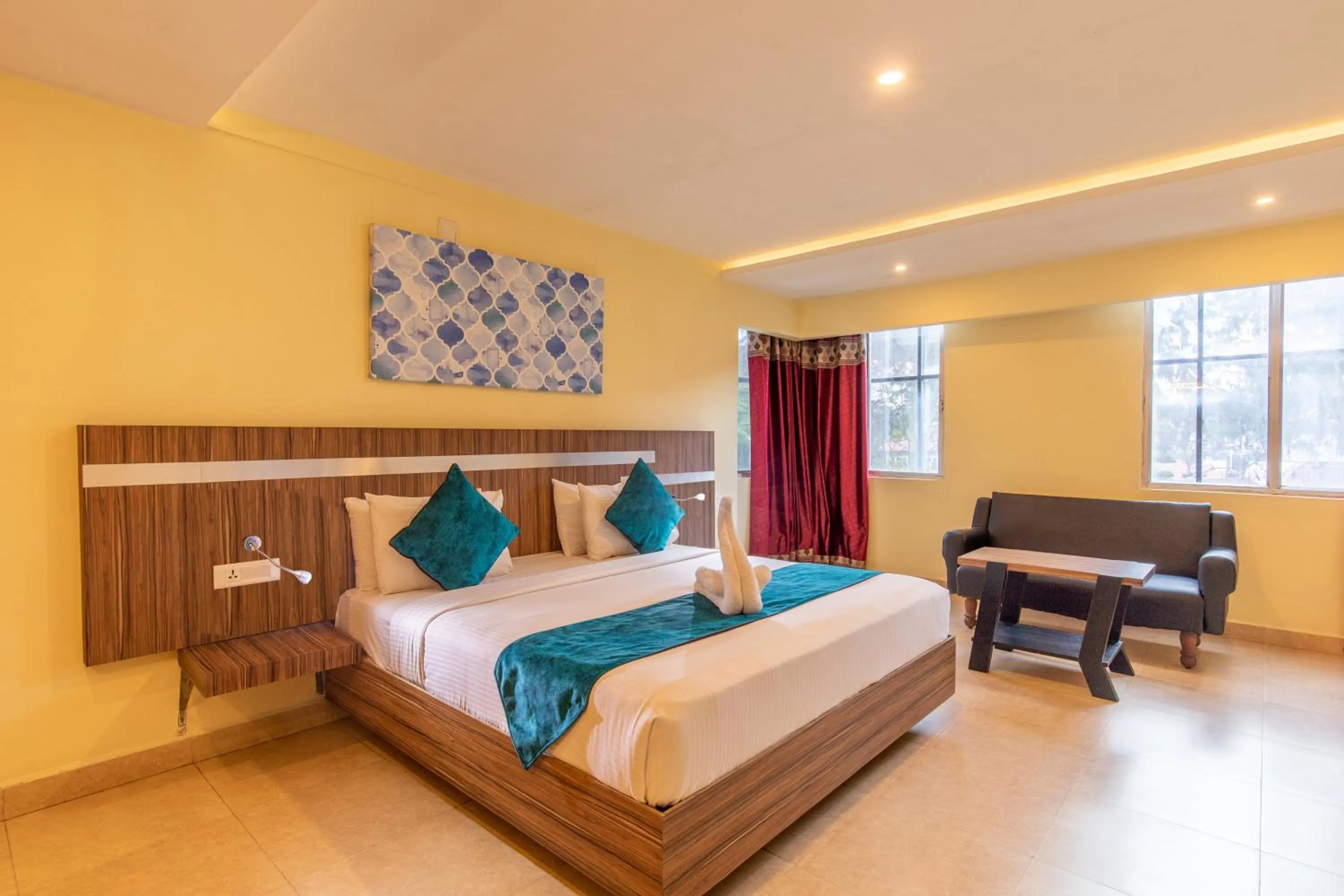 Bed in Vinayaga Inn by Poppys, Ooty