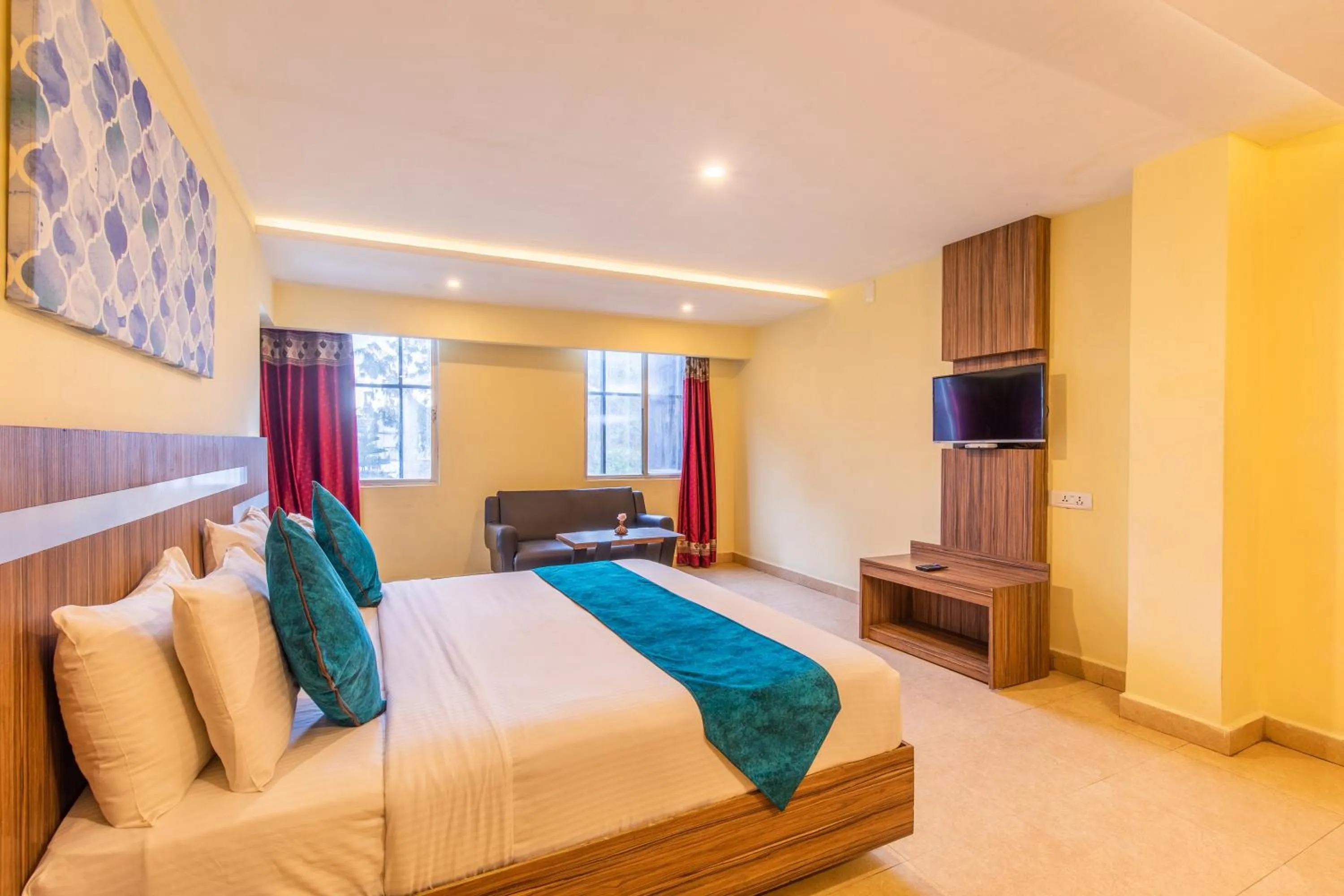 Bed in Vinayaga Inn by Poppys, Ooty