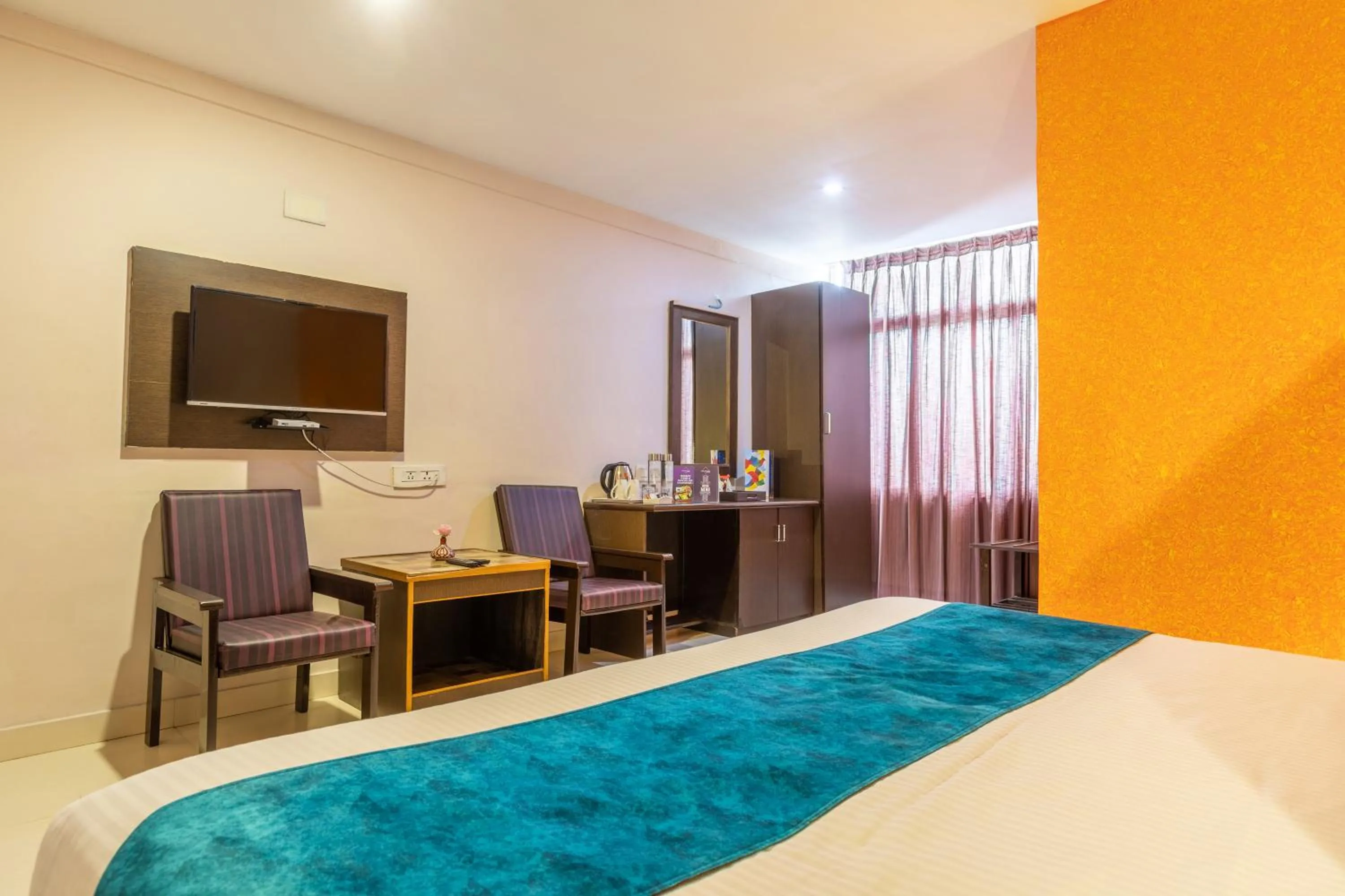 Bed in Vinayaga Inn by Poppys, Ooty