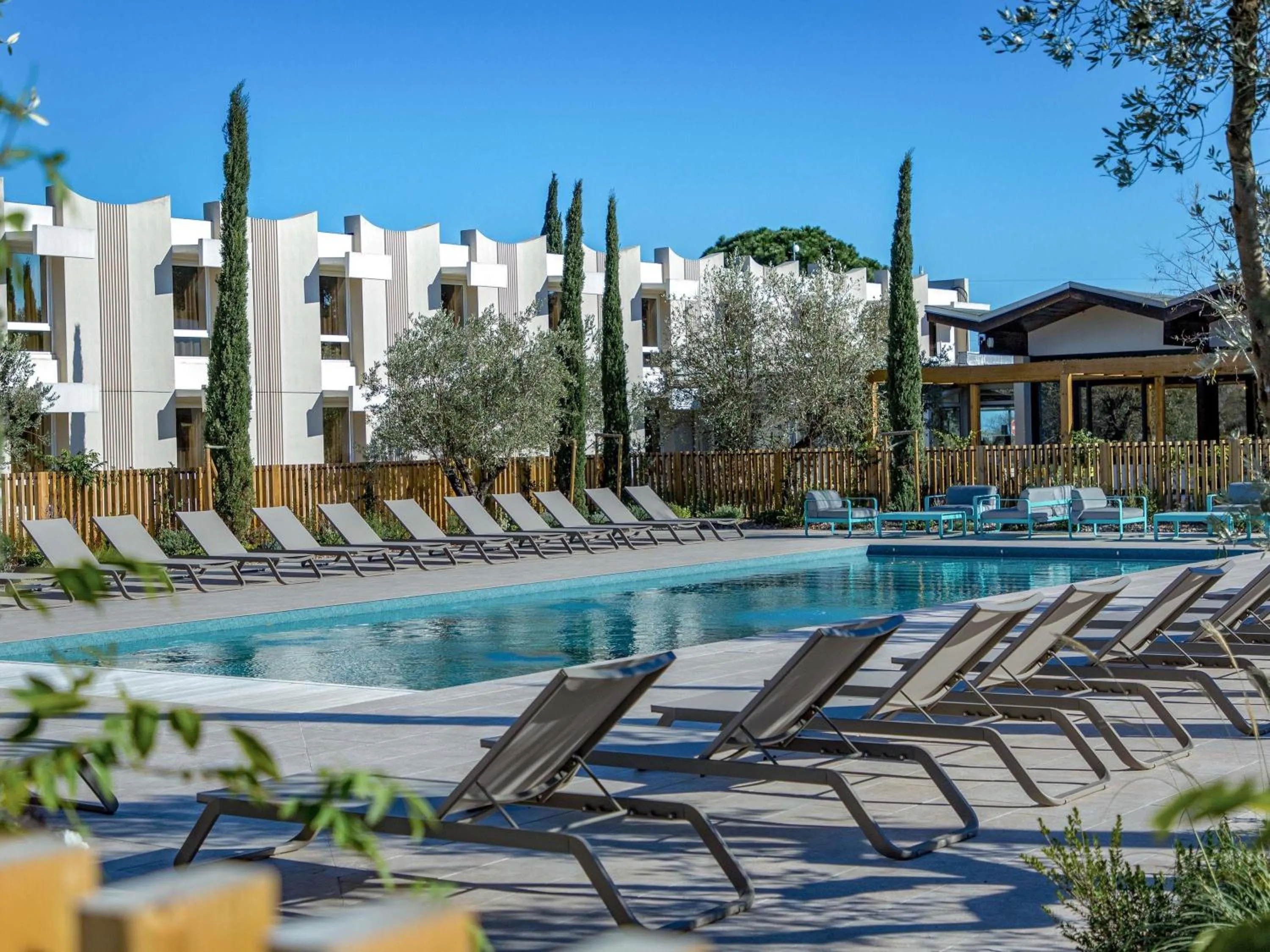 Pool view in Novotel Perpignan Nord Rivesaltes