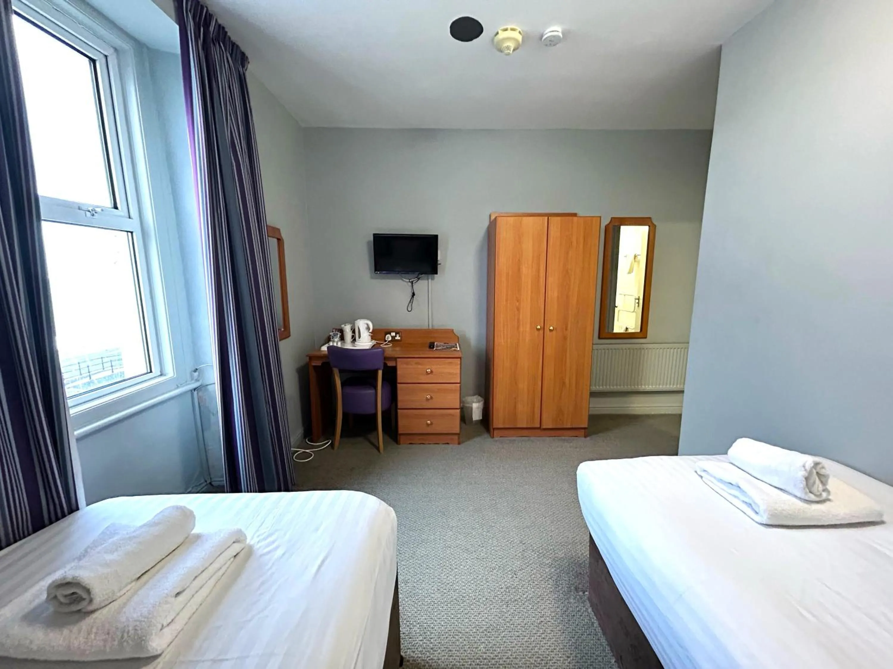 Bed in The Seafront Hotel by Compass Hospitality