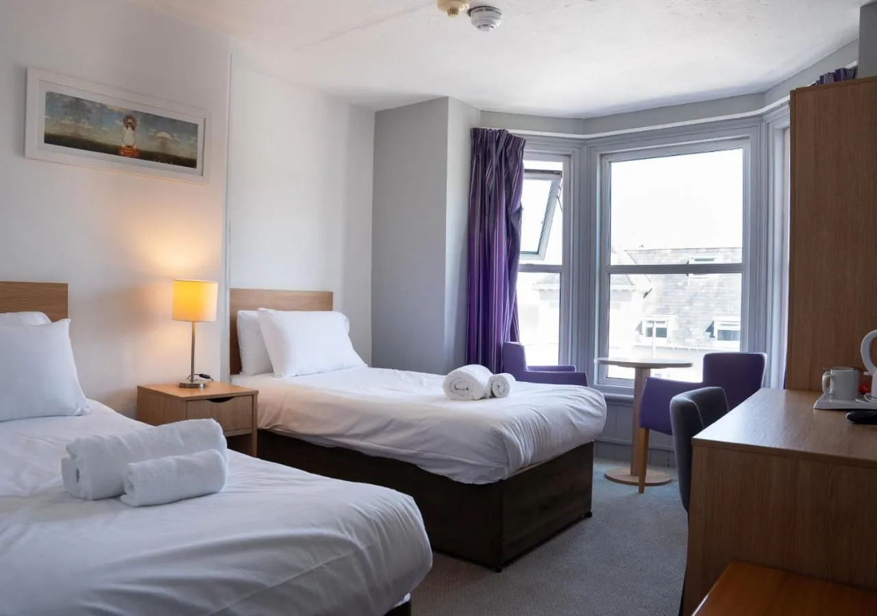 Bed in The Seafront Hotel by Compass Hospitality