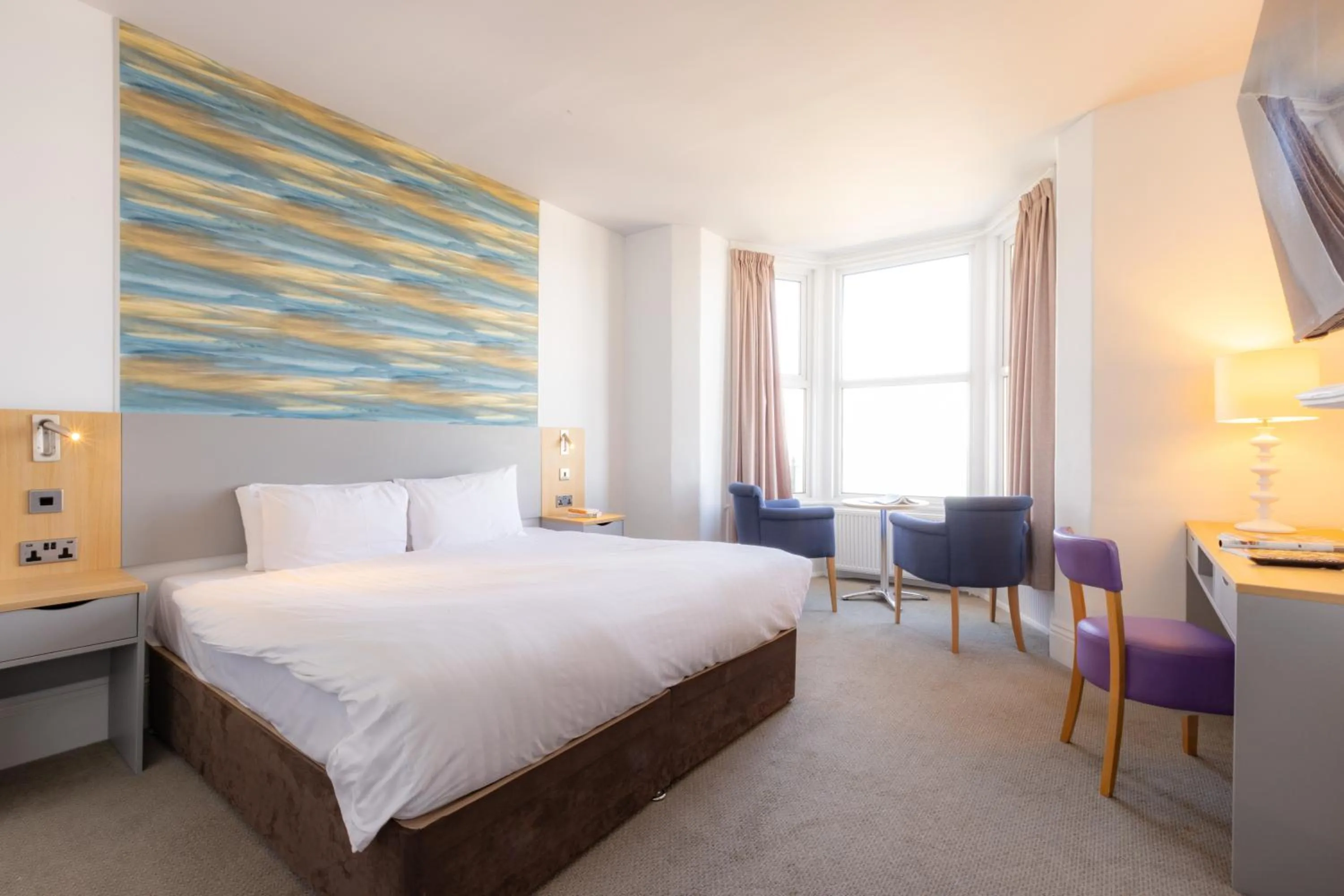 Bed in The Seafront Hotel by Compass Hospitality